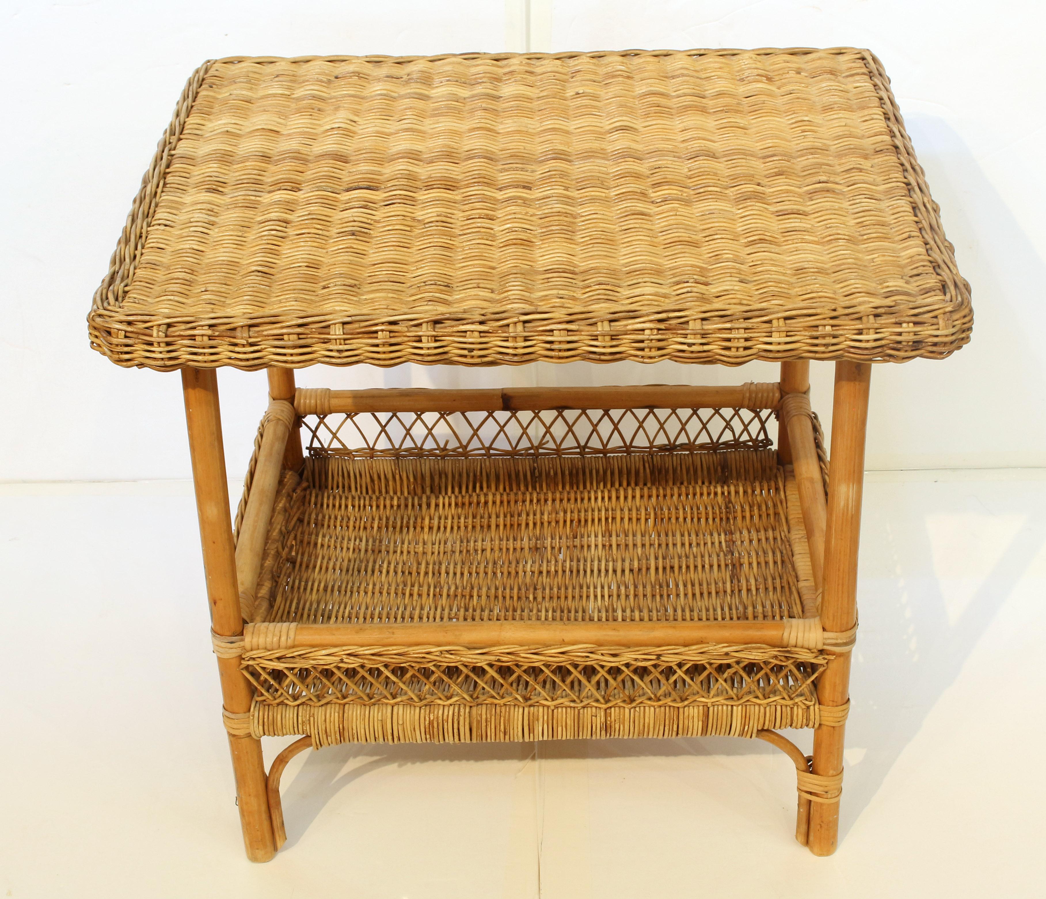 Circa 1980s woven rattan 2-tier side table, American. Galleried lower shelf. Southern yellow pine secondary. 23.5