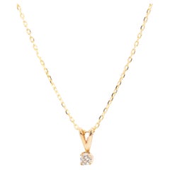 Circa 1980s Solitaire Diamond Vintage 9 Carat Yellow Gold Pendant and Chain