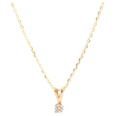 Circa 1980s Solitaire Diamond Vintage 9 Carat Yellow Gold Pendant and Chain