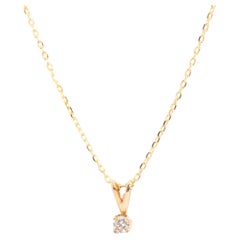 Circa 1980s Solitaire Diamond Retro 9 Carat Yellow Gold Pendant and Chain