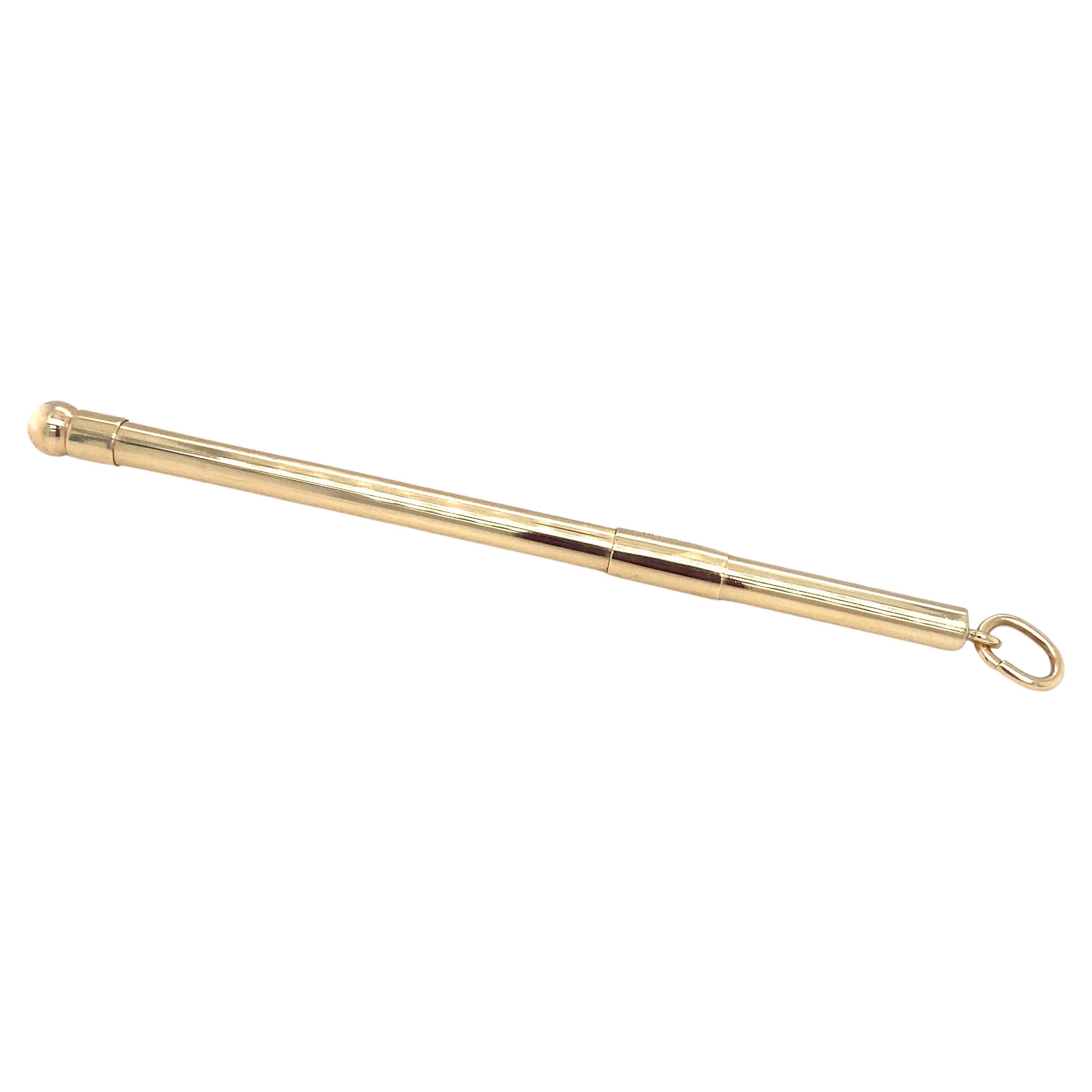 Circa 1980s TIFFANY & CO. Swizzle Stick Pendant in 14K Gold For Sale
