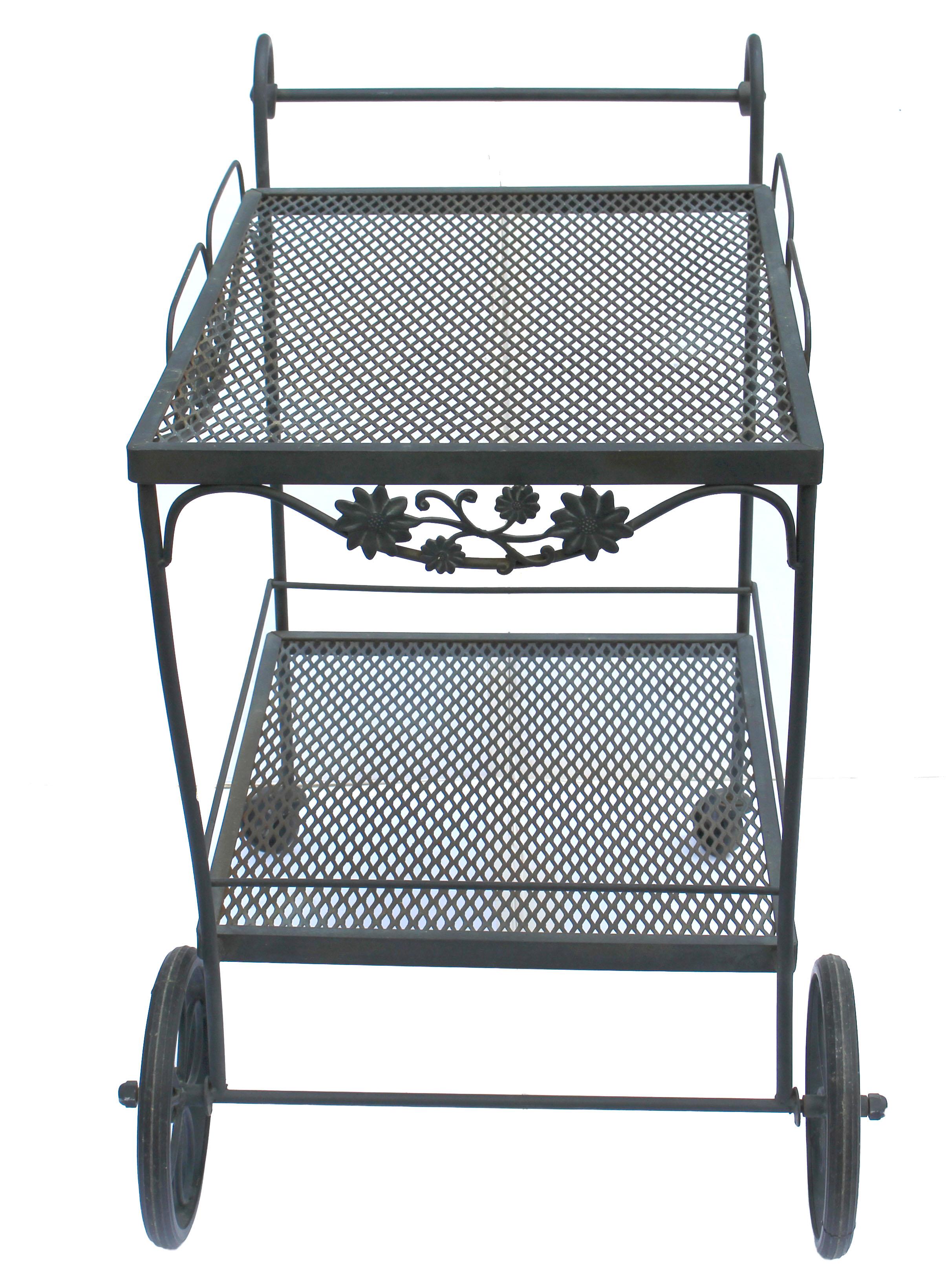 Circa 1980s wrought iron bar cart by Russell Woodard. The 