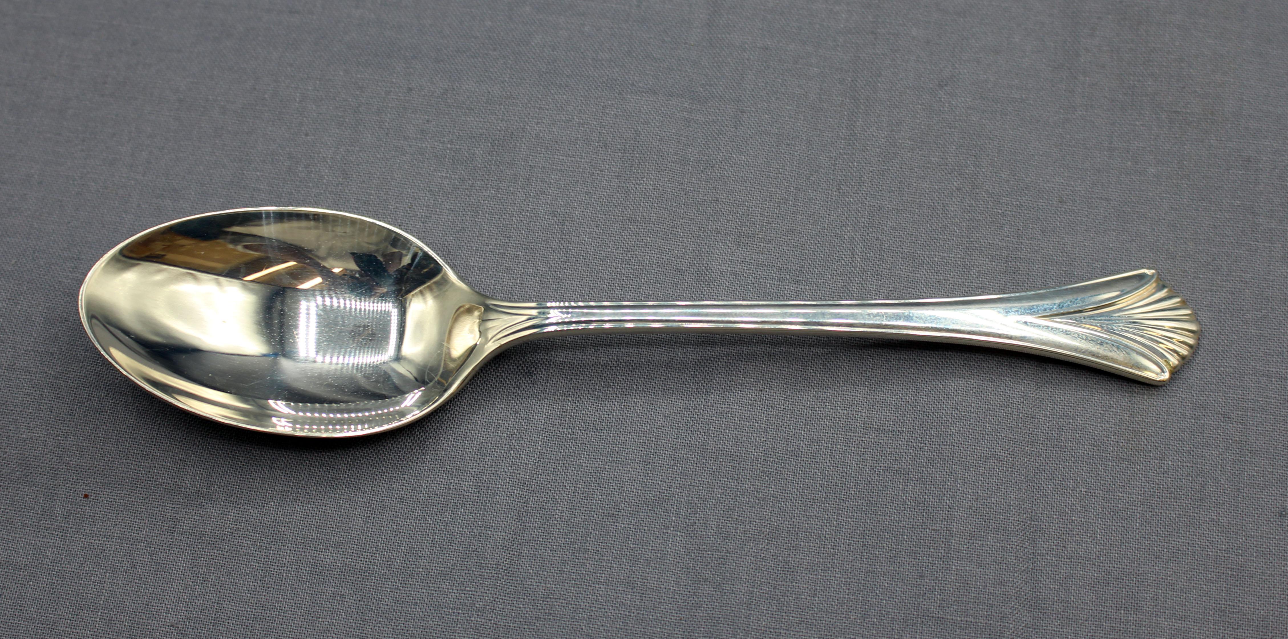 Circa 1989 4-piece place setting of Regency Shell by Lunt. Sterling silver, never used. 4.50 troy oz. 9
