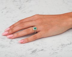 1 Carat Emerald and 0.25 Carat Diamond 18 Karat Gold Ring, circa 1990s