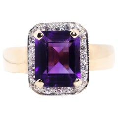 Circa 1990s 9 Cart Yellow Gold Emerald Cut Amethyst and Diamond Vintage Ring