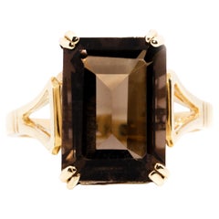 Circa 1990s Emerald Cut Smokey Quartz Vintage Ring in 9 Carat Yellow Gold