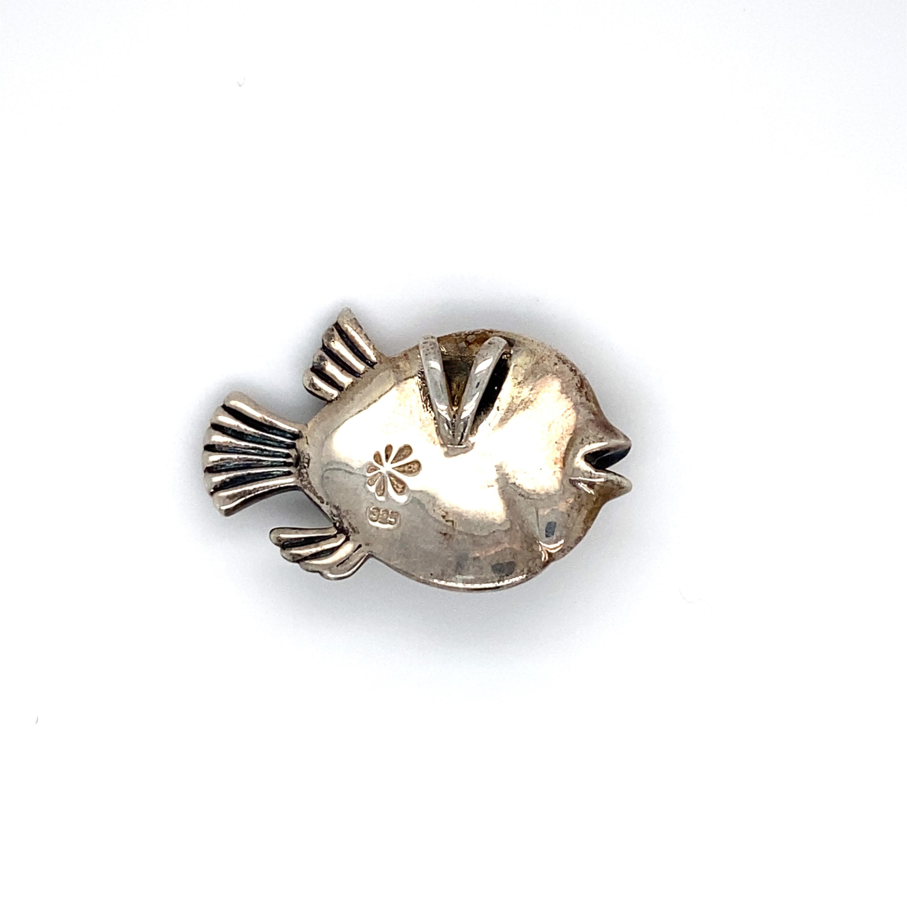 Circa: 1990s
Metal Type: Sterling silver
Weight: 11.4g
Dimensions: 1.25in W