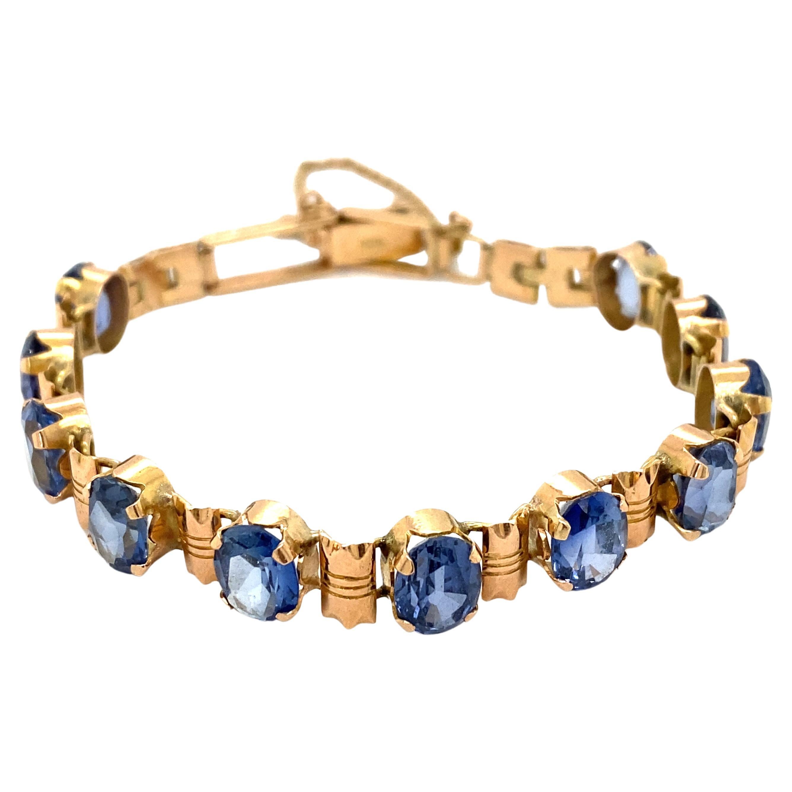 Circa 1990s Oval Iolite Bracelet in 14 Karat Yellow Gold