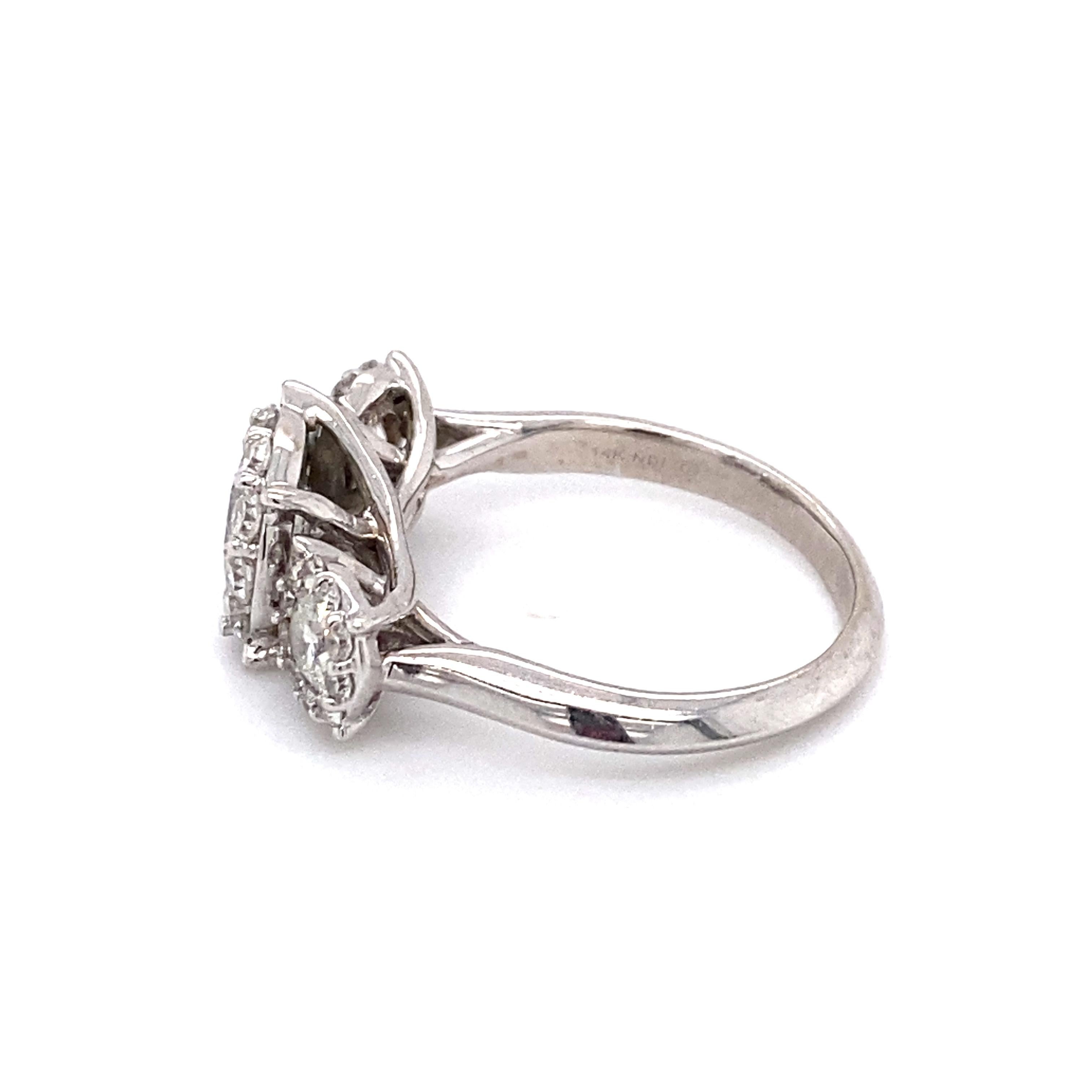 Circa: 1990s
Metal Type: 14 Karat White Gold
Weight: 4.8 grams
Size: US 6.5, resizable

Diamond Details:

Carat: 2.50 carat total weight
Shape: Round brilliant
Color: I-J
Clarity: SI1