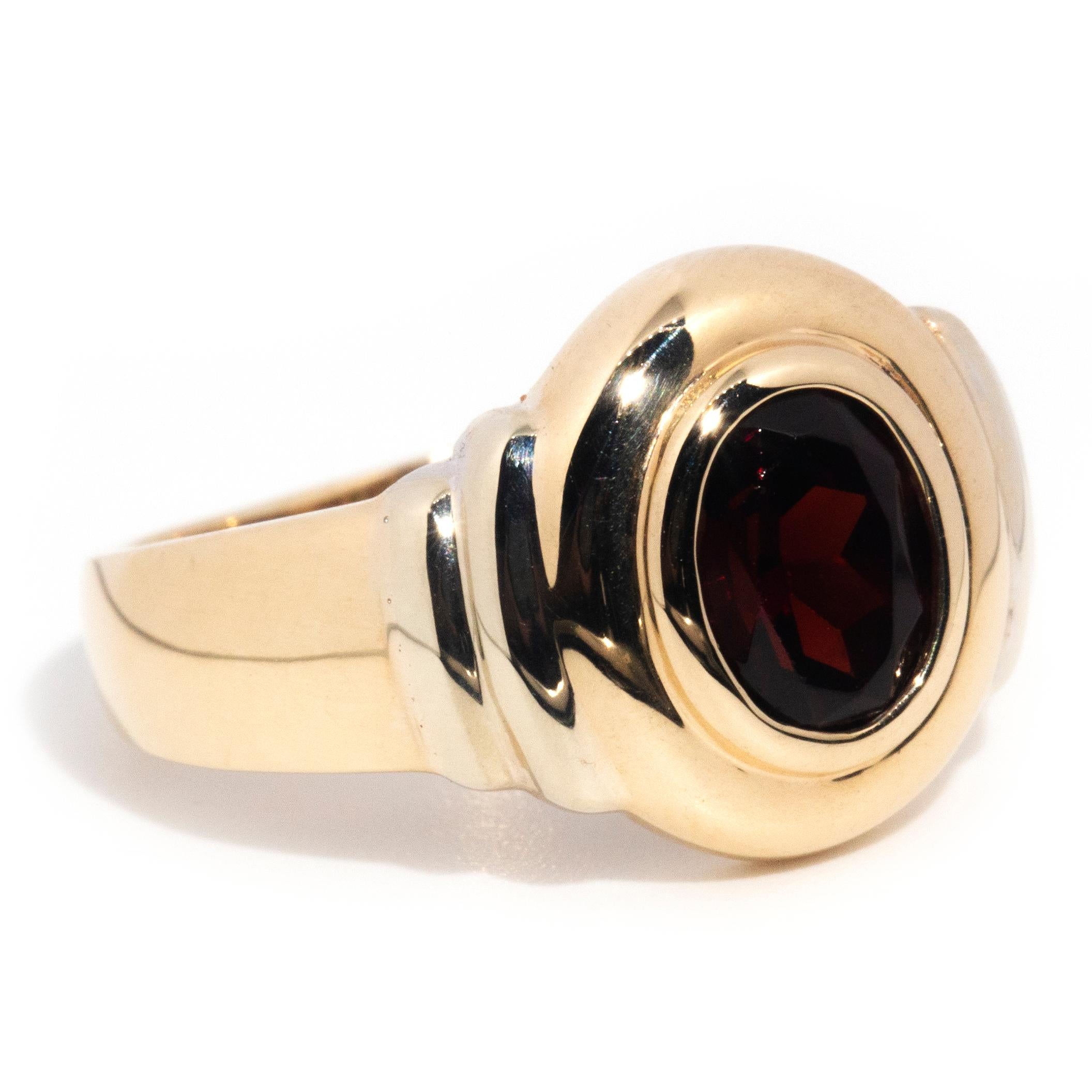 Modern circa 1990s, Vintage 9 Carat Yellow Gold Double Rub over Oval Cut Garnet Ring For Sale