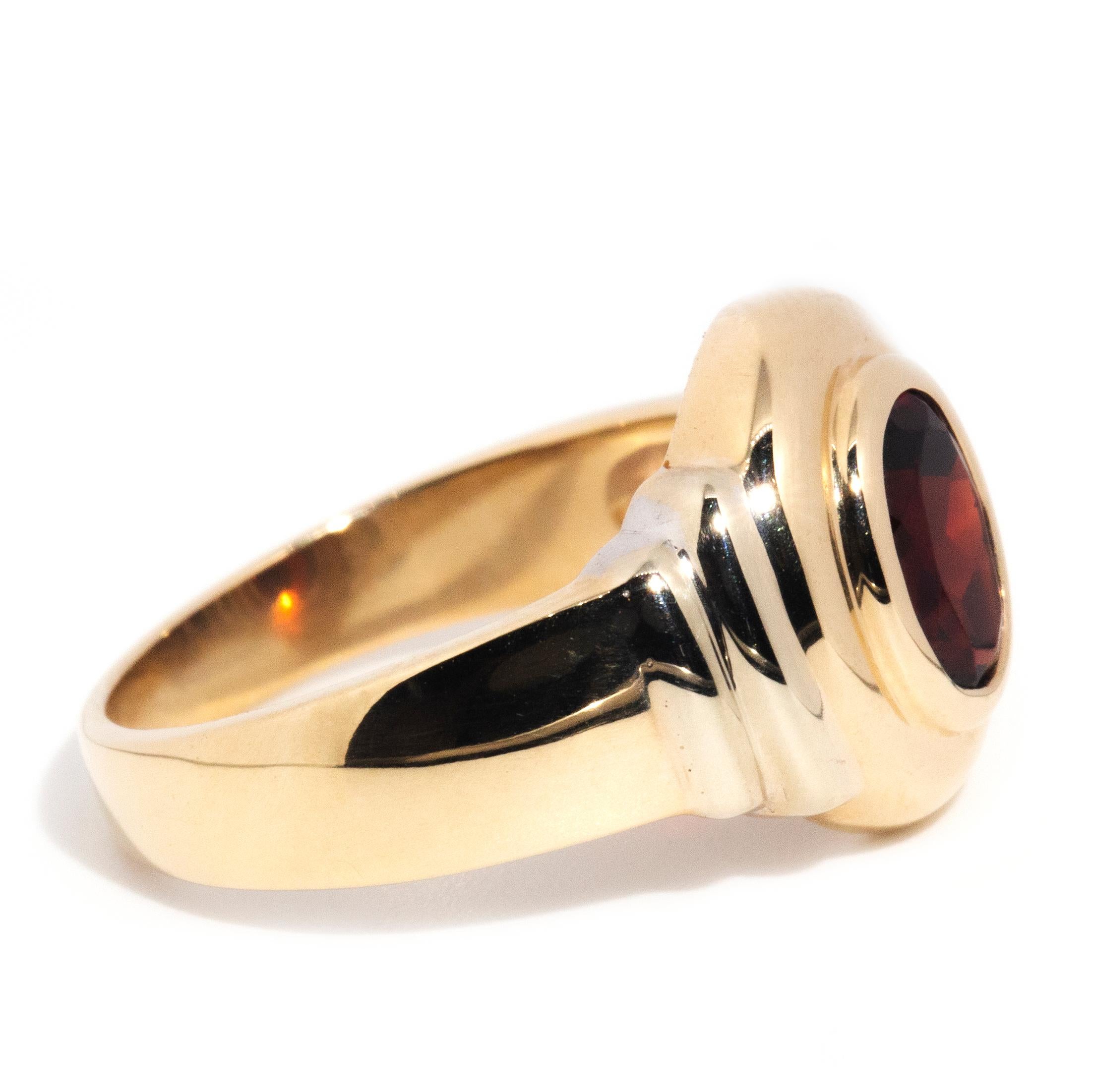 circa 1990s, Vintage 9 Carat Yellow Gold Double Rub over Oval Cut Garnet Ring For Sale 2
