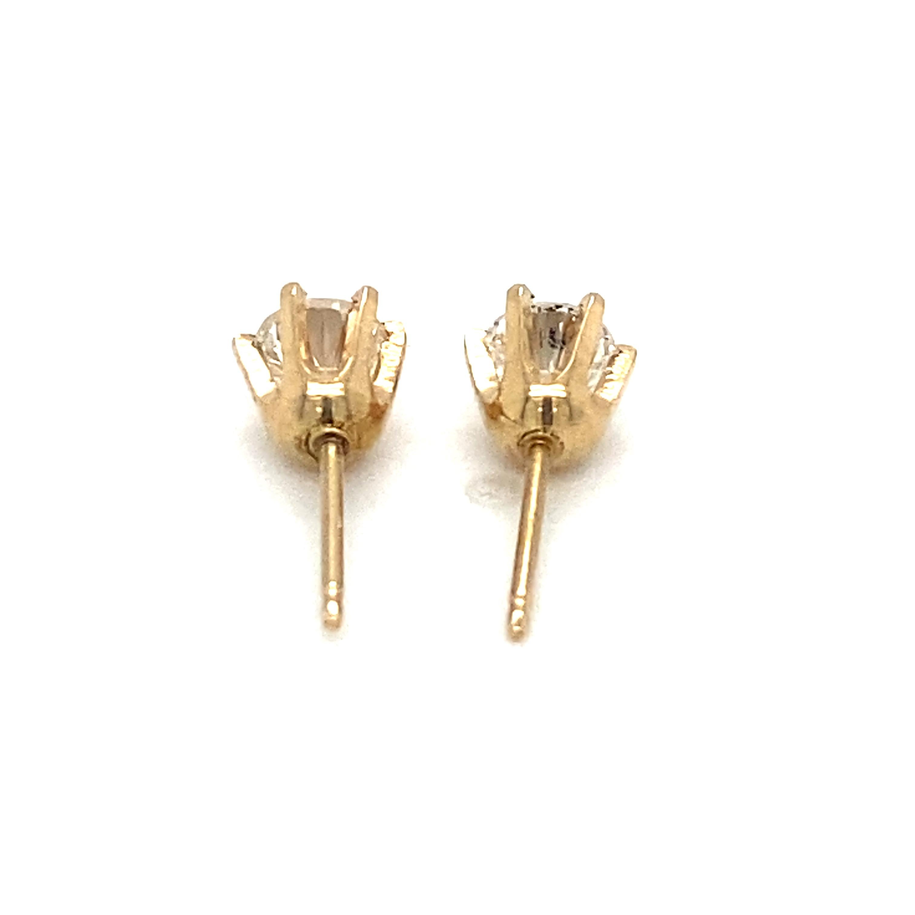 Item Details: These stud earrings have round diamonds at over half a carat total weight. They are perfect for wearing everyday, and make a great gift as well!

Circa: 2000s
Metal Type: 14 Karat Yellow Gold
Weight: 1.0 grams

Diamond Details:

Carat: