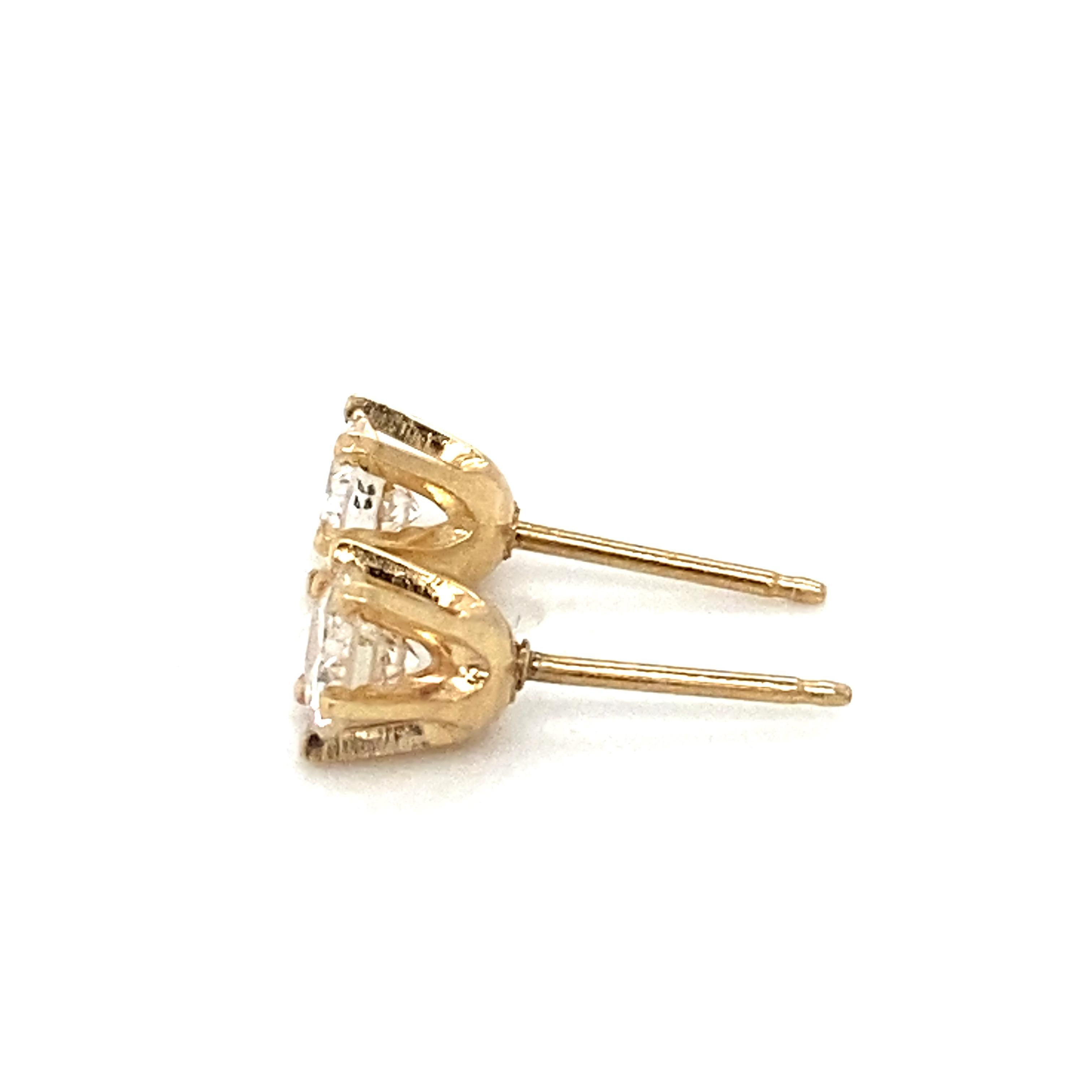 Modern 0.67 Carat Total Round Diamond Stud Earrings in 14 Karat Gold, circa 2000s For Sale