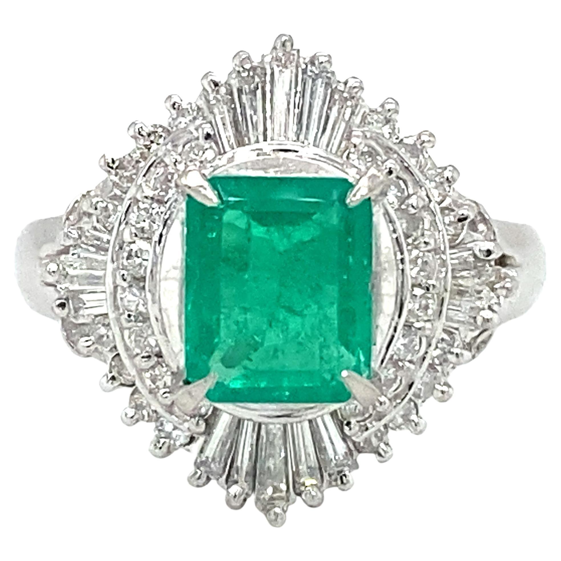 Circa 2000s 1.02 Carat Emerald and Diamond Cocktail Ring in Platinum