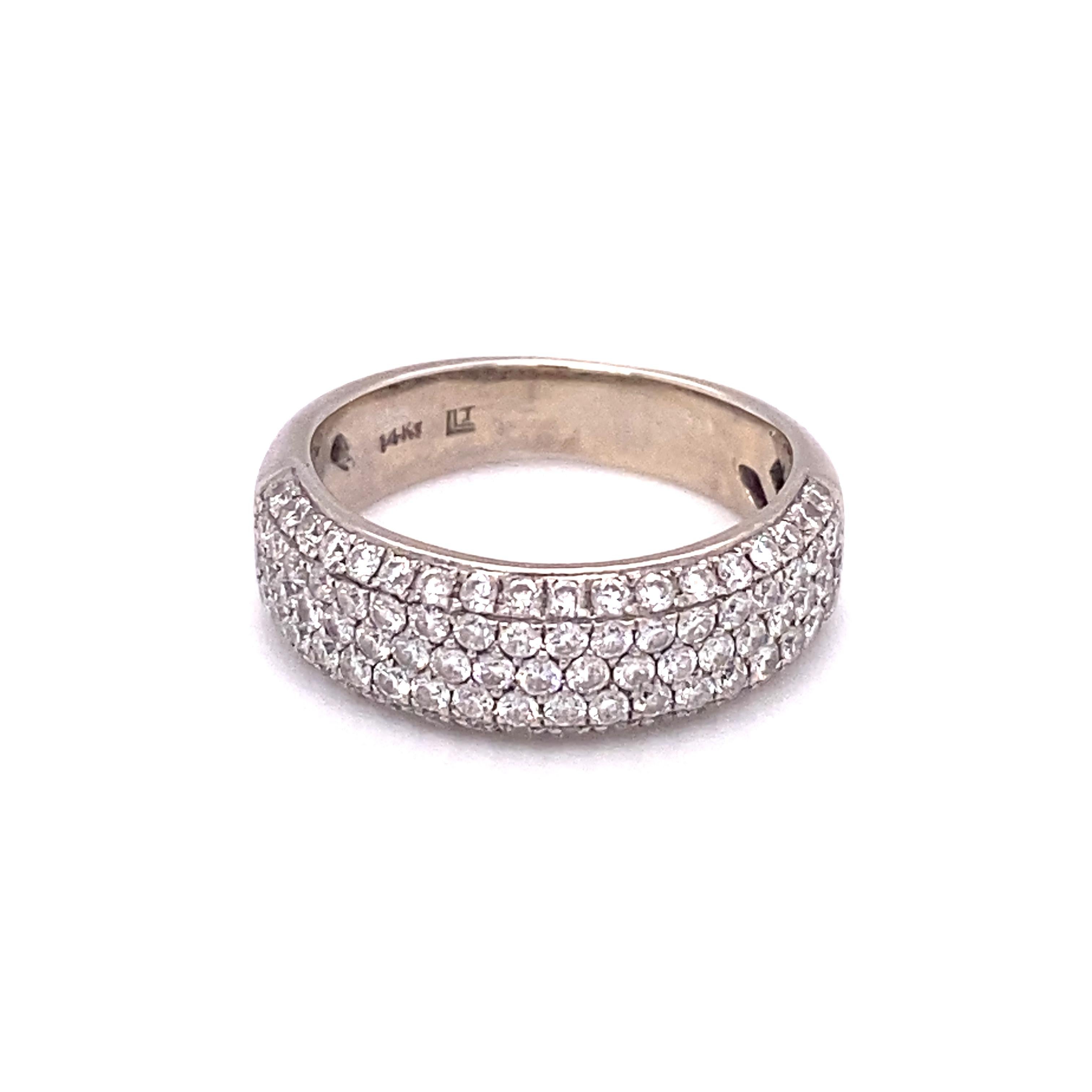 Item Details: This five row band features over one carat of diamonds. 

Circa: 2000s
Metal Type: 14 Karat White Gold
Weight: 4.3 grams
Size: US 5.5

Diamond Details:

Carat: 1.25 carat total weight
Shape: Round
Color: G
Clarity: VS-SI
 