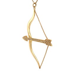 Circa 2000s Diamond Bow and Arrow Pendant and Chain in 14K Gold