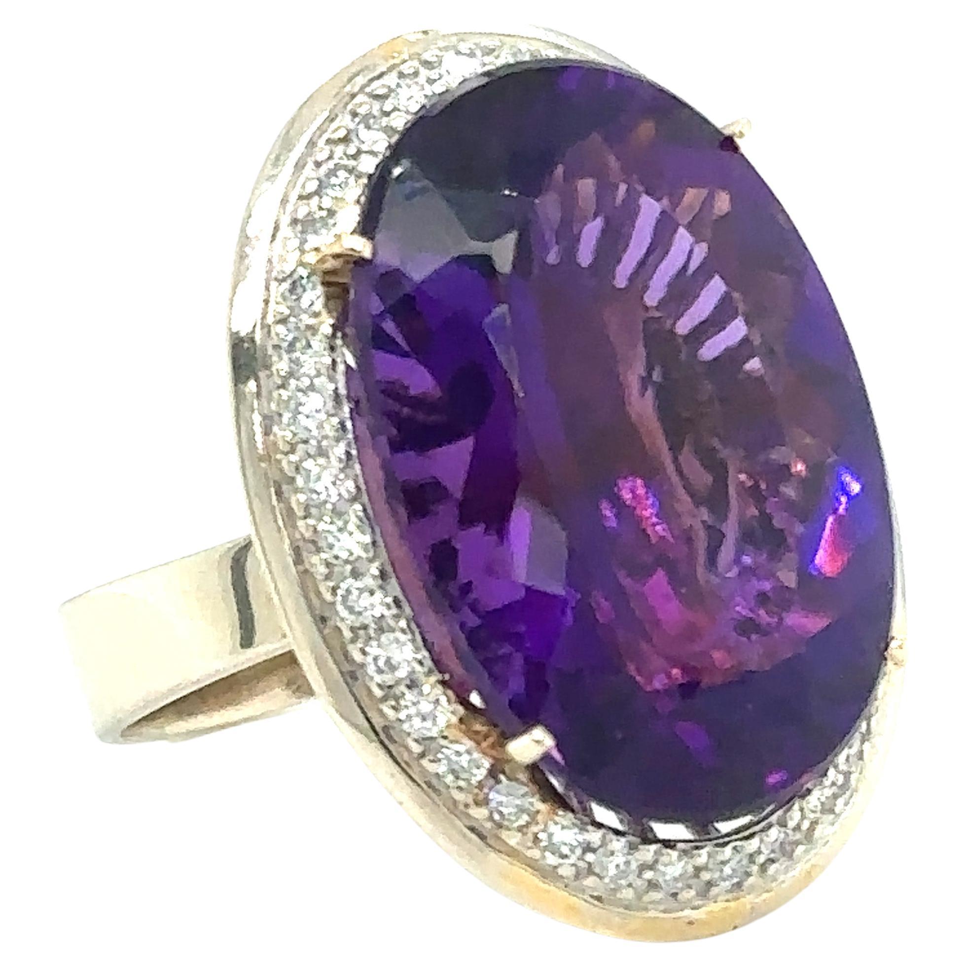 Large Oval Brilliant Amethyst Ring with Diamonds in 14 Karat Gold, circa 2000s For Sale