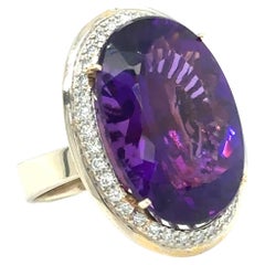 Large Oval Brilliant Amethyst Ring with Diamonds in 14 Karat Gold, circa 2000s