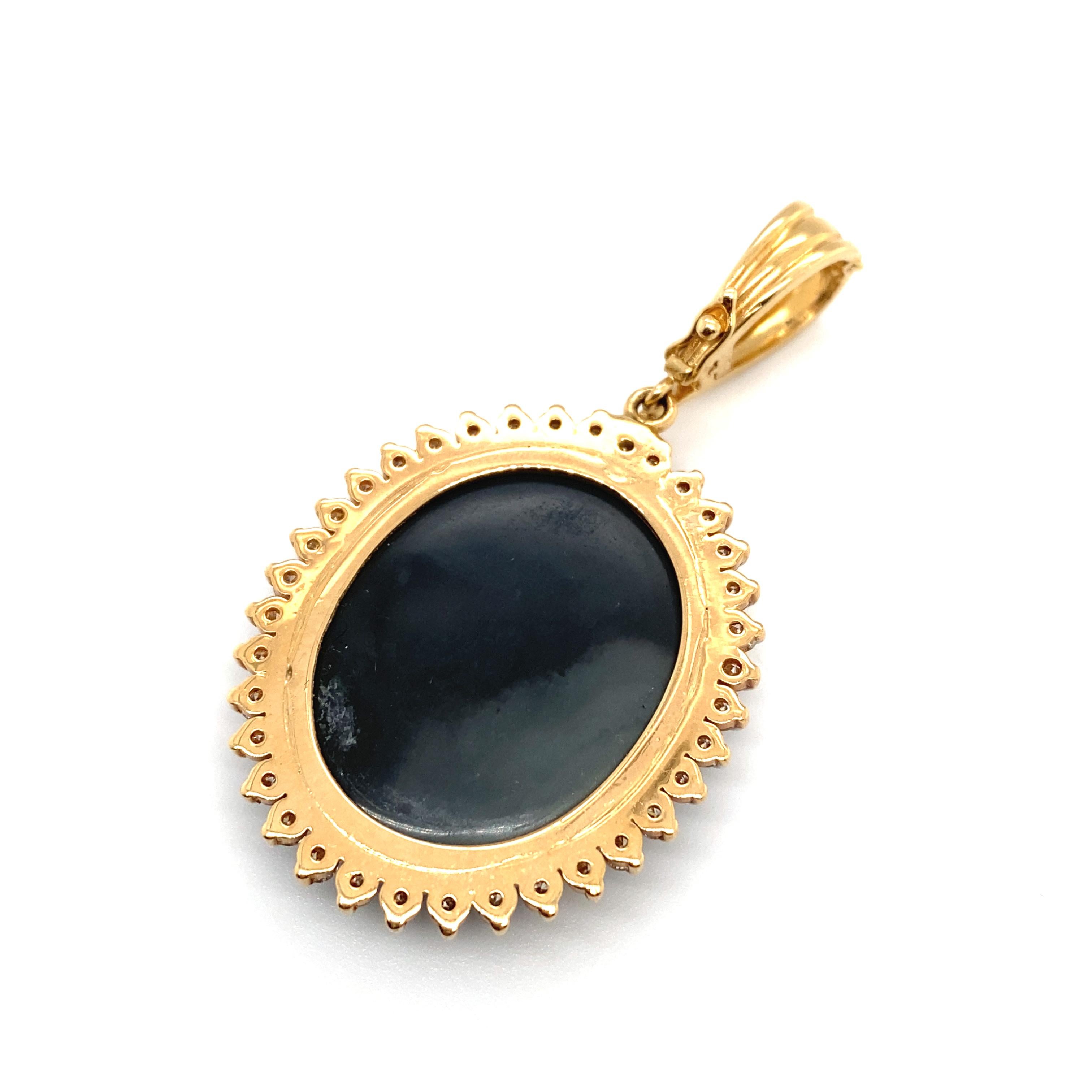 Item Details: This pendant with an oval opal doublet has a one-carat total weight diamond halo.

Circa: 2000s
Metal Type: 14 Karat Yellow Gold
Weight: 10.6 grams
Size: 2 inch Length including bail

Diamond Details:

Carat: 1.0 carat total