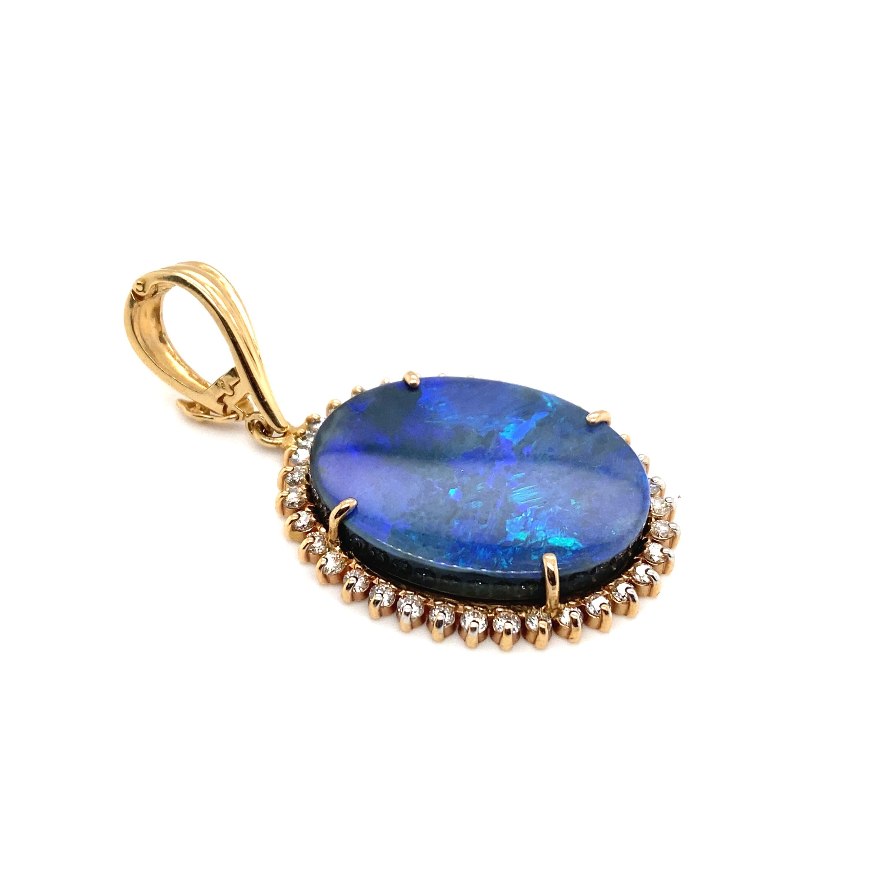 Modern Circa 2000s Oval Opal Doublet Pendant with Diamonds in 14 Karat Yellow Gold For Sale