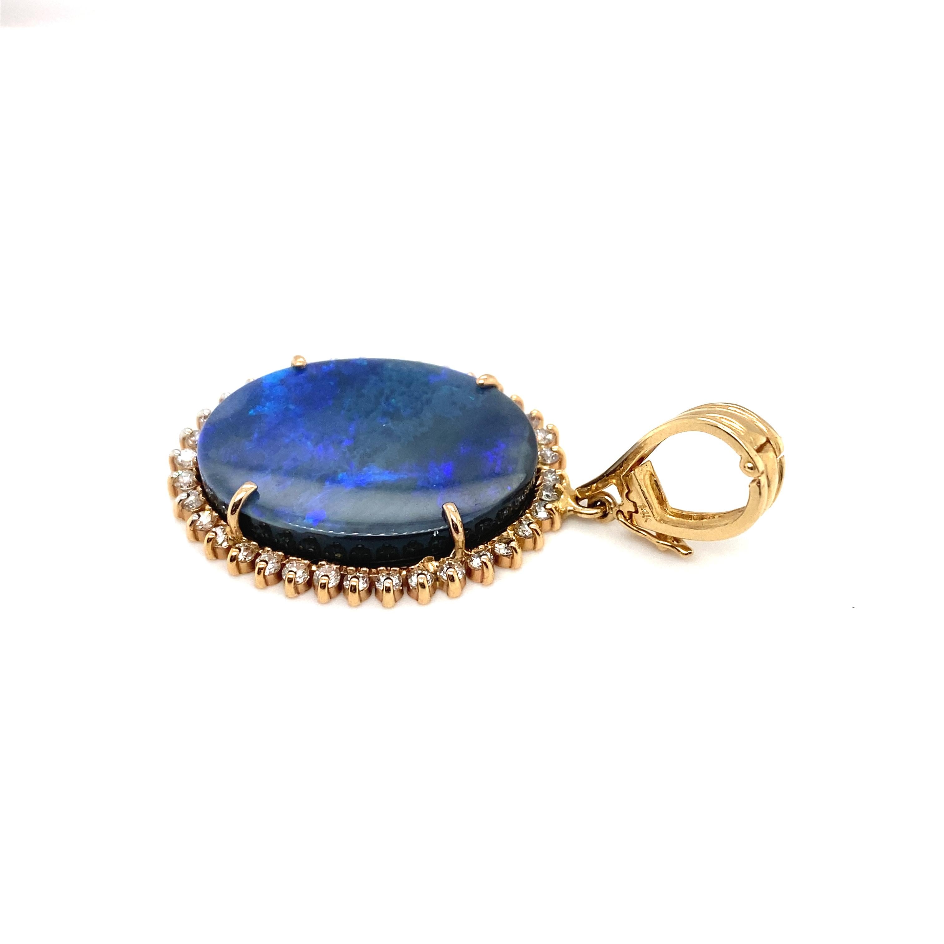 Oval Cut Circa 2000s Oval Opal Doublet Pendant with Diamonds in 14 Karat Yellow Gold For Sale