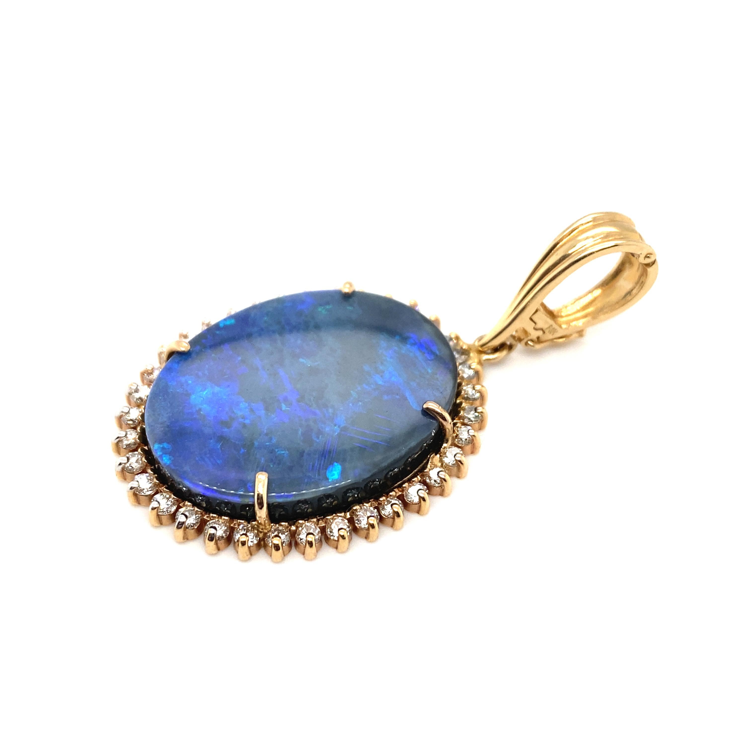 Circa 2000s Oval Opal Doublet Pendant with Diamonds in 14 Karat Yellow Gold In Excellent Condition For Sale In Atlanta, GA