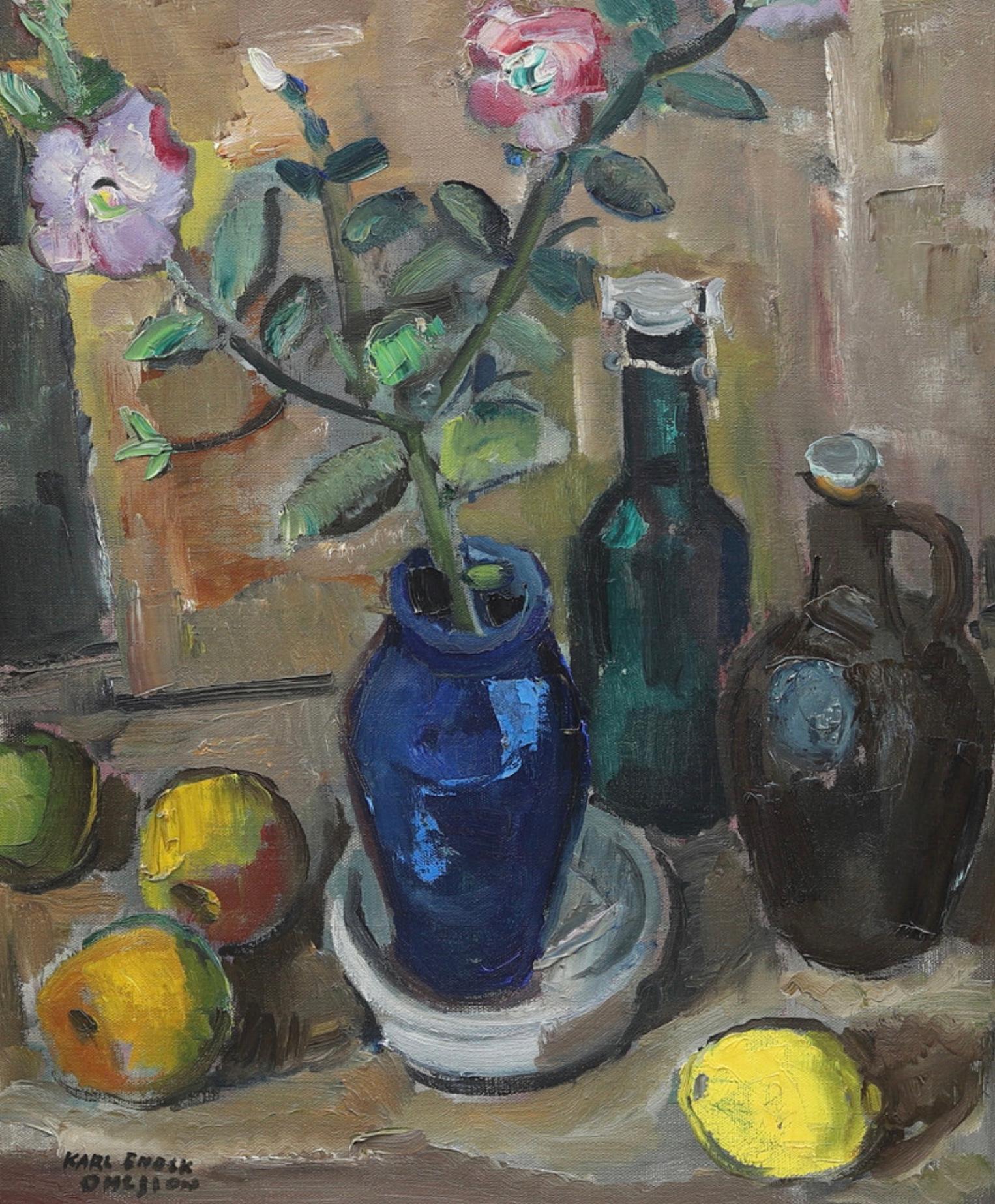 Pleasant and calming Swedish oil on canvas still life painting of a vase with a branch of flowering pink camellias surrounded by bottles and fruit.

Mid Circa 20th and signed by the artist Karl Ohlsson.