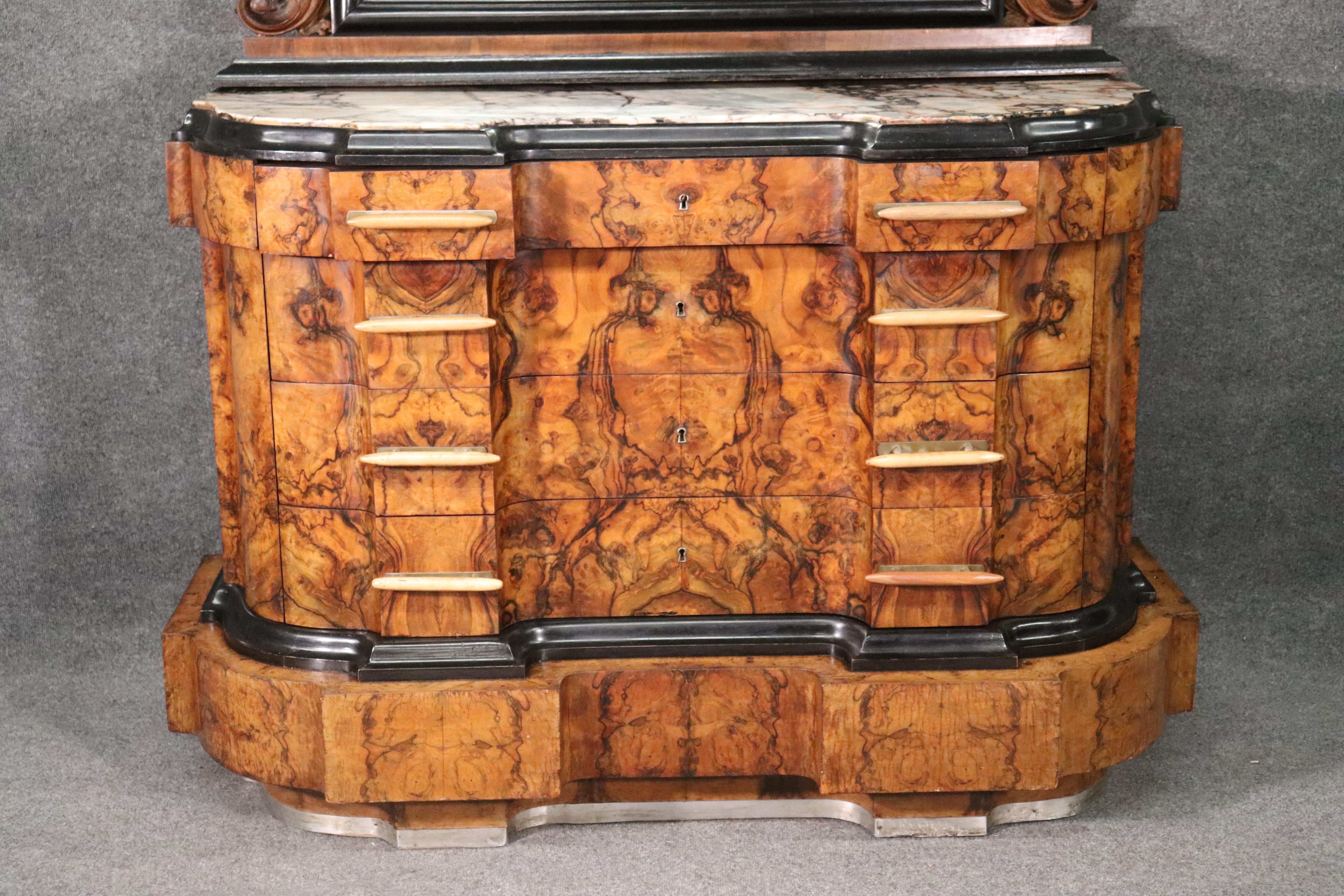 Early 20th Century Circassian Walnut Carved Italian Art Deco Grand Dresser with Matching Mirror