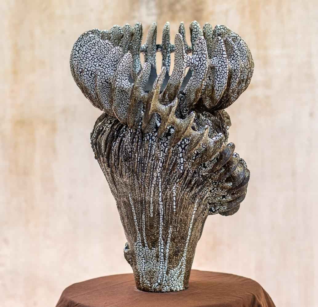 Circium Vase in Black Clay with Crawl Glazing by Kallia Panopoulou
Dimensions: Ø 27 x H 39 cm. 
Materials: Stoneware.

Available in different finish options: Black clay crawl glazing, Mat white glazing on stoneware, or Deep blue glossy glazing from
