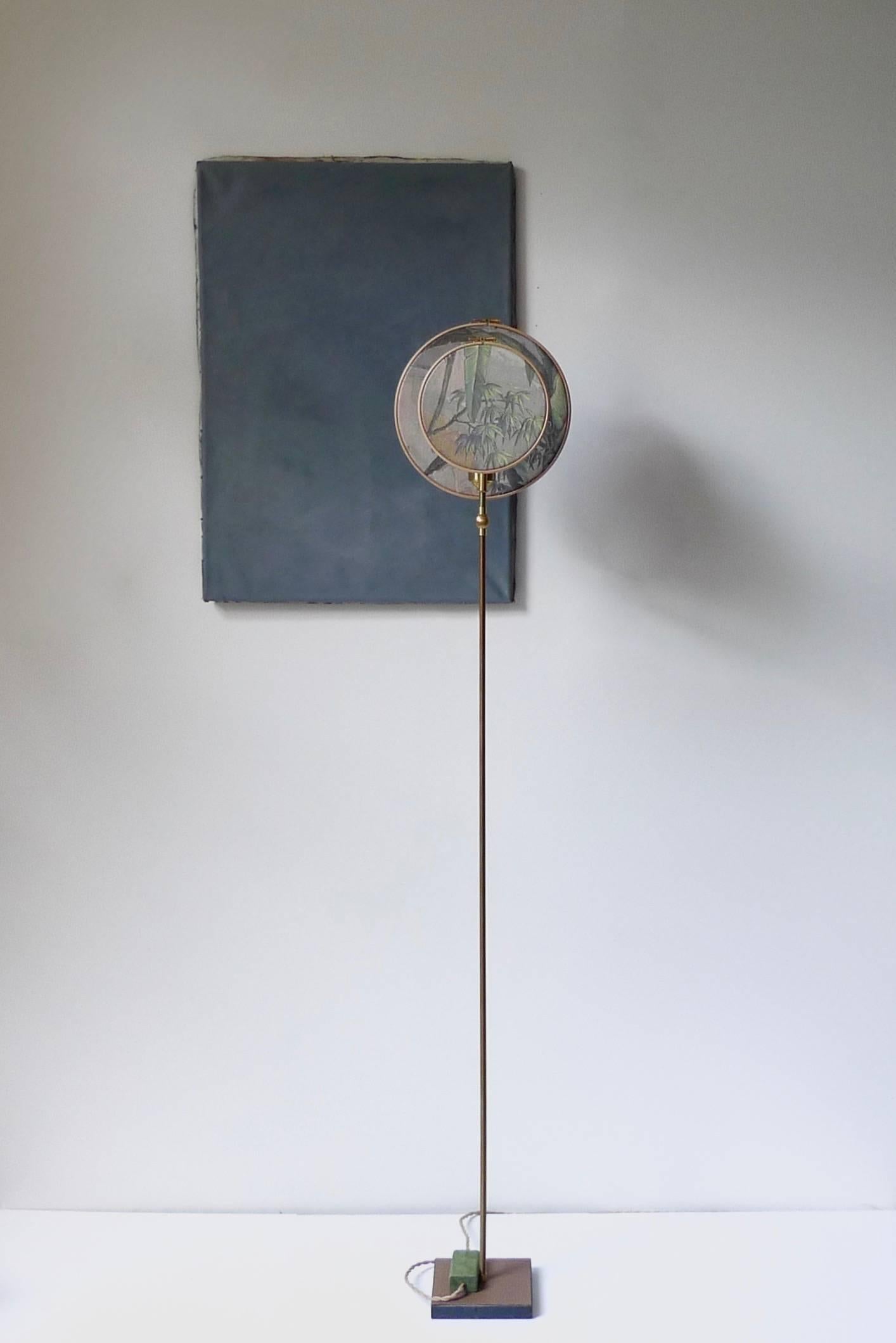 Light object, floor lamp, circle blue grey
Handmade in brass, leather, wood and hand printed and painted linen.
A dimmer is inlaid with leather.
Dimensions: H 146 x W 27 x D 16 cm.
The design artwork is meticulously handcrafted in a limited