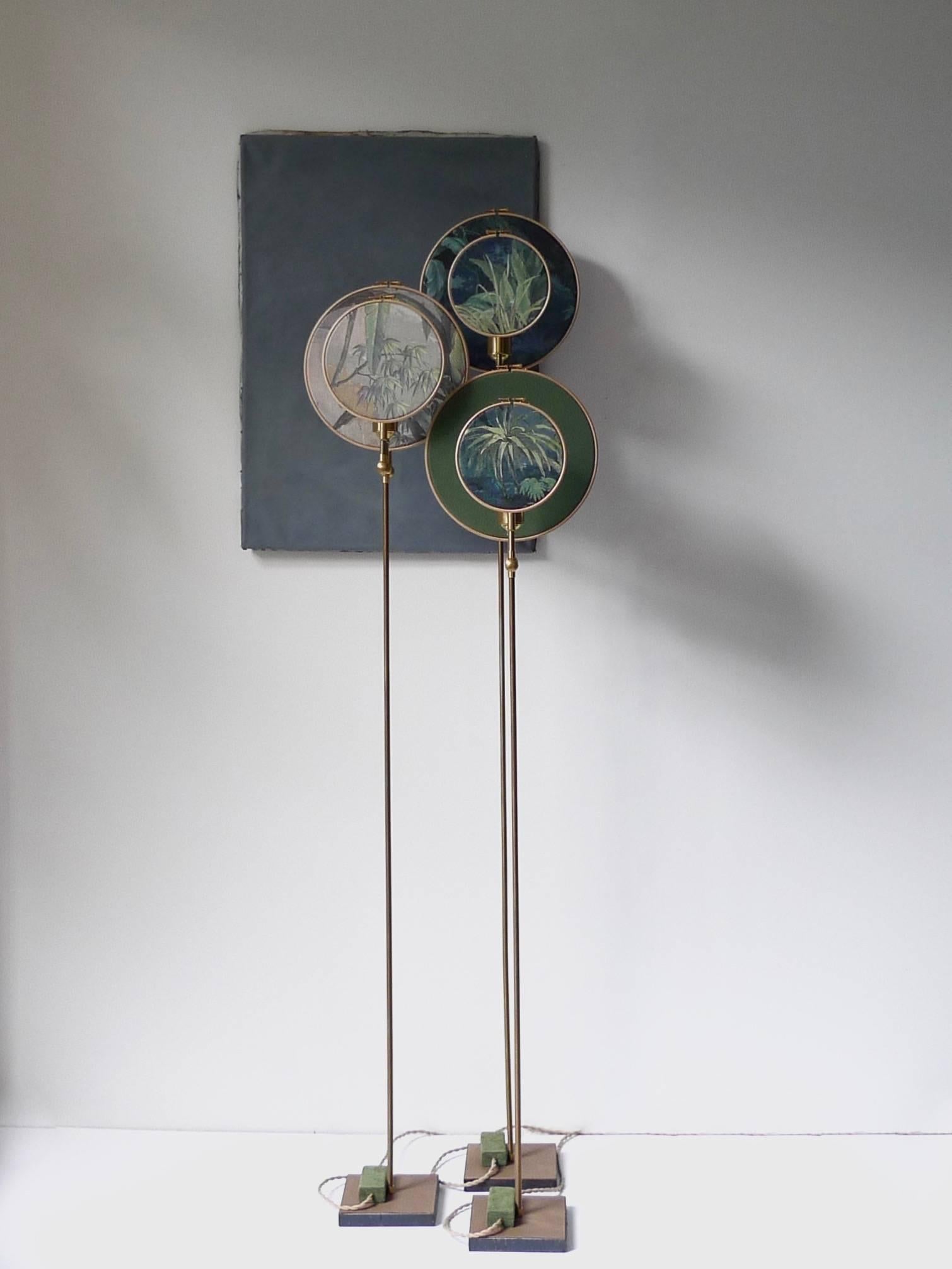 Light object, floor lamp, circle blue grey.
Handmade in brass, leather, wood and hand printed and painted linen.
A dimmer is inlaid with leather.
Dimensions: H 160 x W 27 x D 16 cm.
The design artwork is meticulously handcrafted in a limited