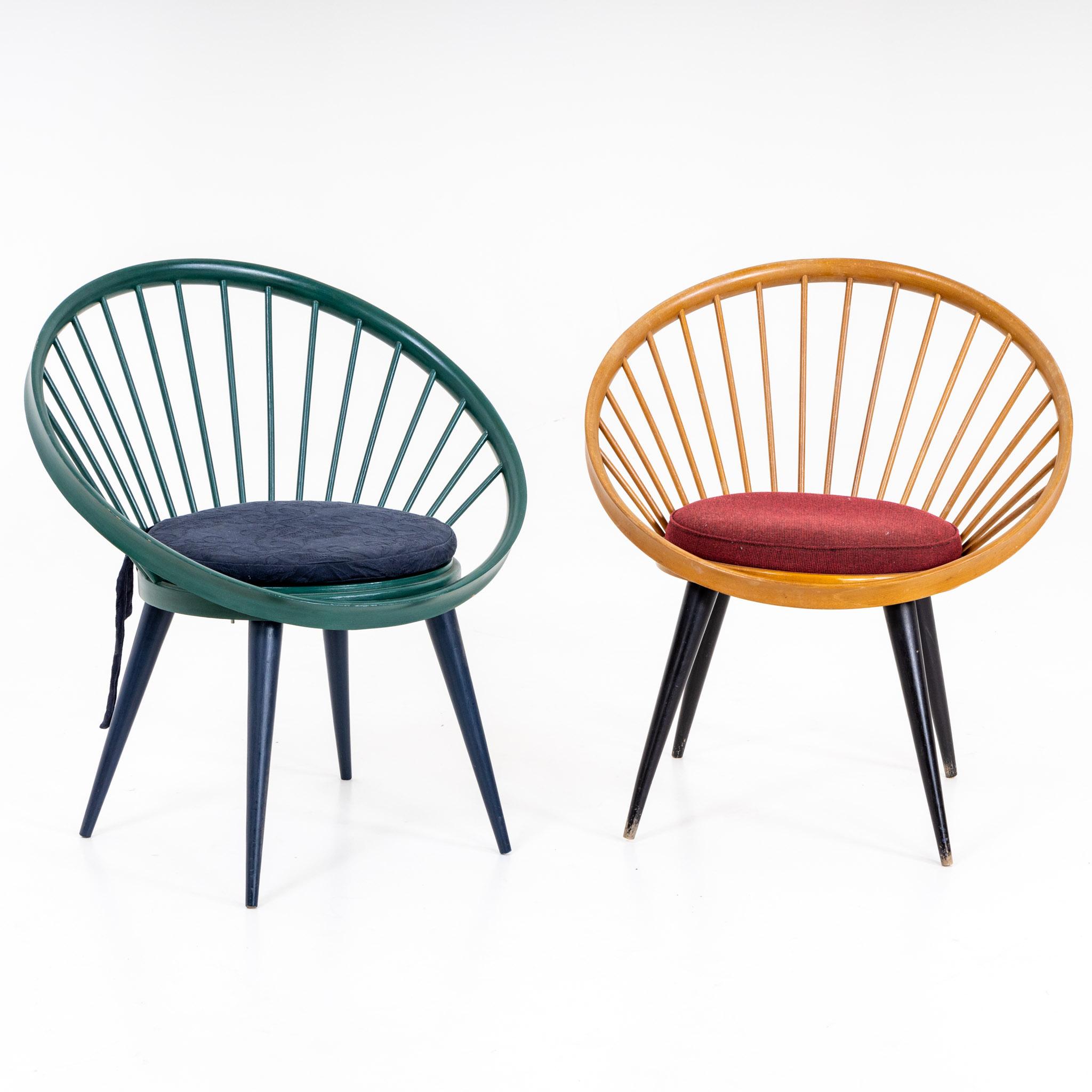 Pair of Circle chairs by Yngve Ekström on square pointed feet in blue-green and black-yellow respectively. The color may have been renewed once.