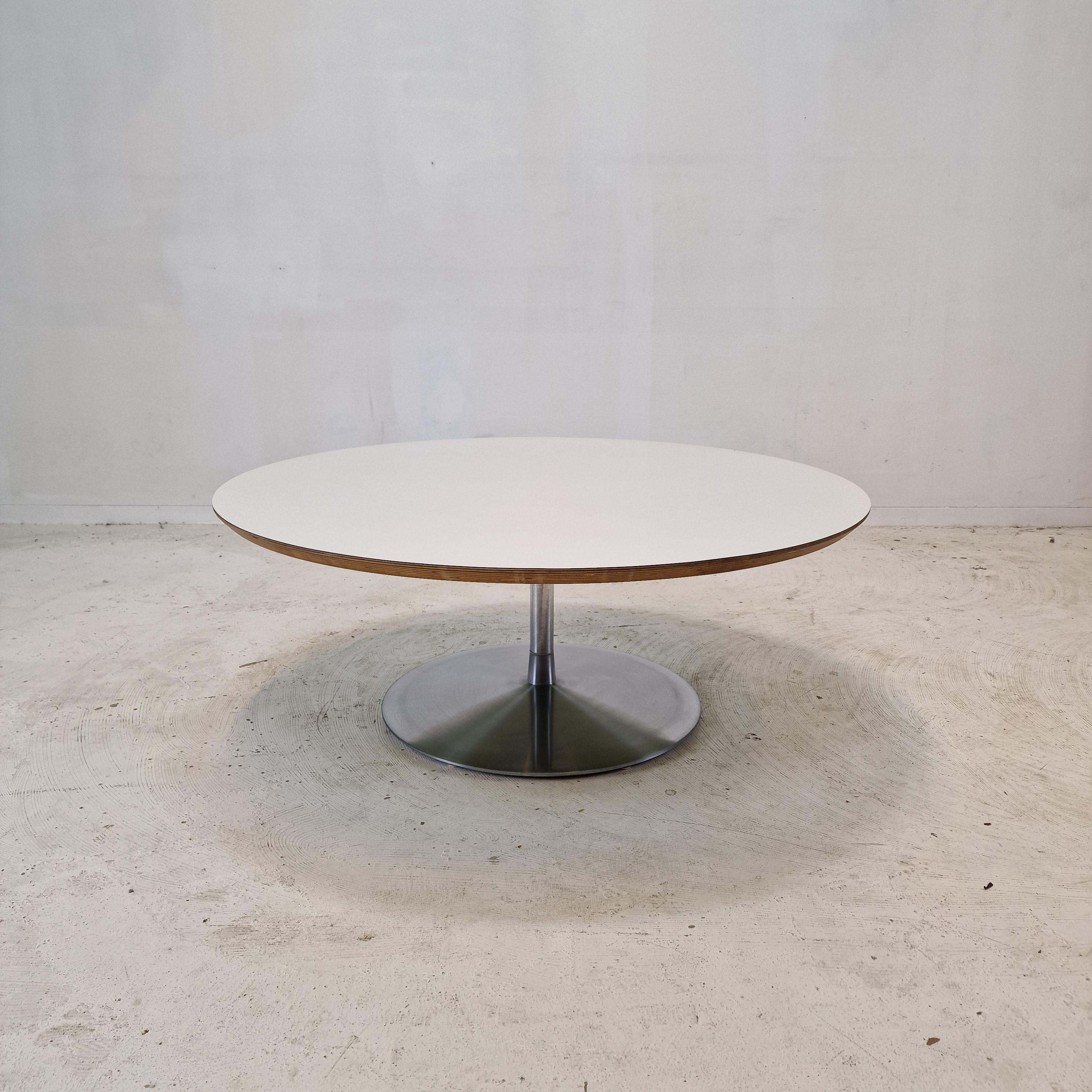 Very nice round coffee table, designed by Pierre Paulin in the 1960s. 
This particular table is fabricated end 60's.

The name of the table is 