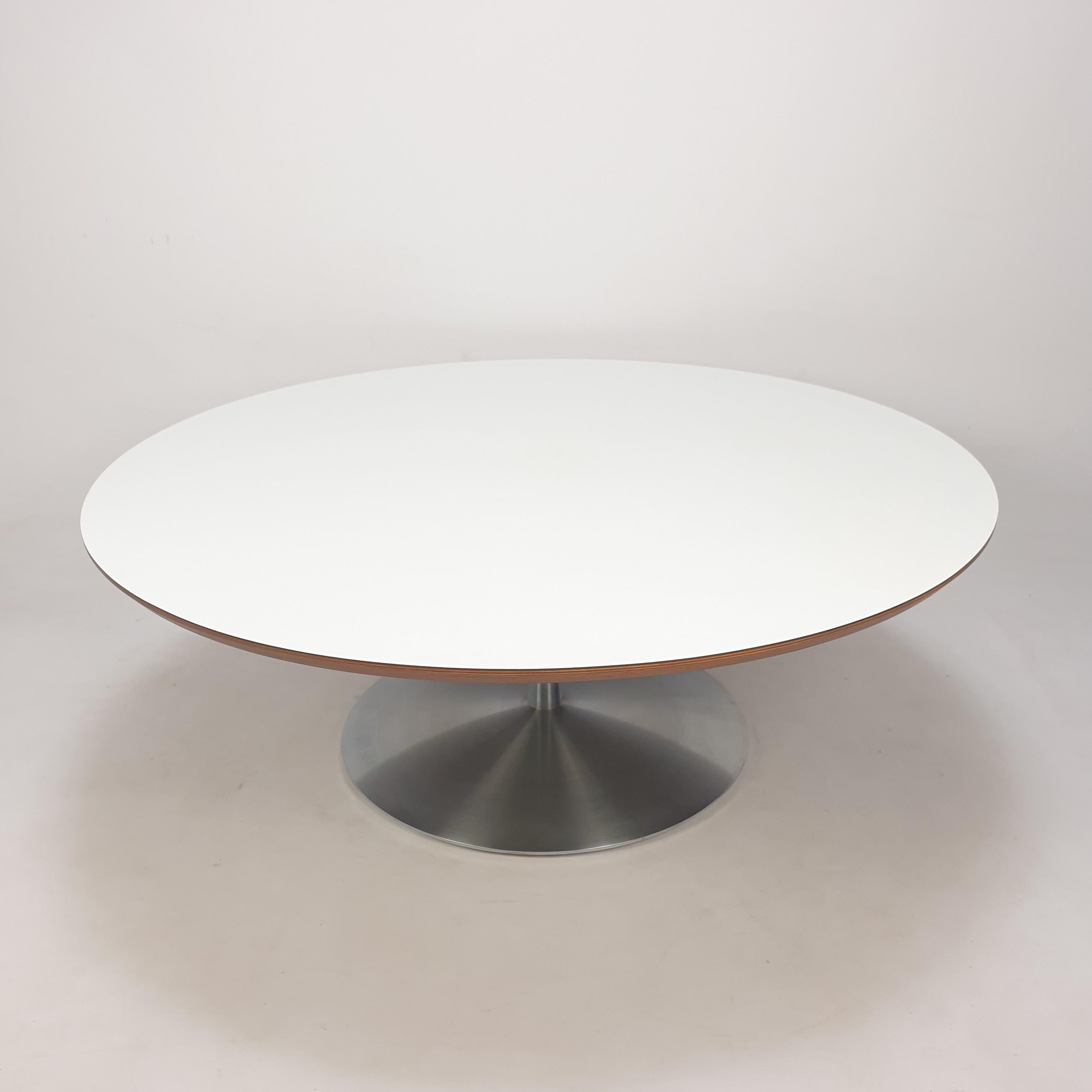 Very nice round coffee table, designed by Pierre Paulin in the 60's. 
This particular table is fabricated in the 70's.

The name of the table is 