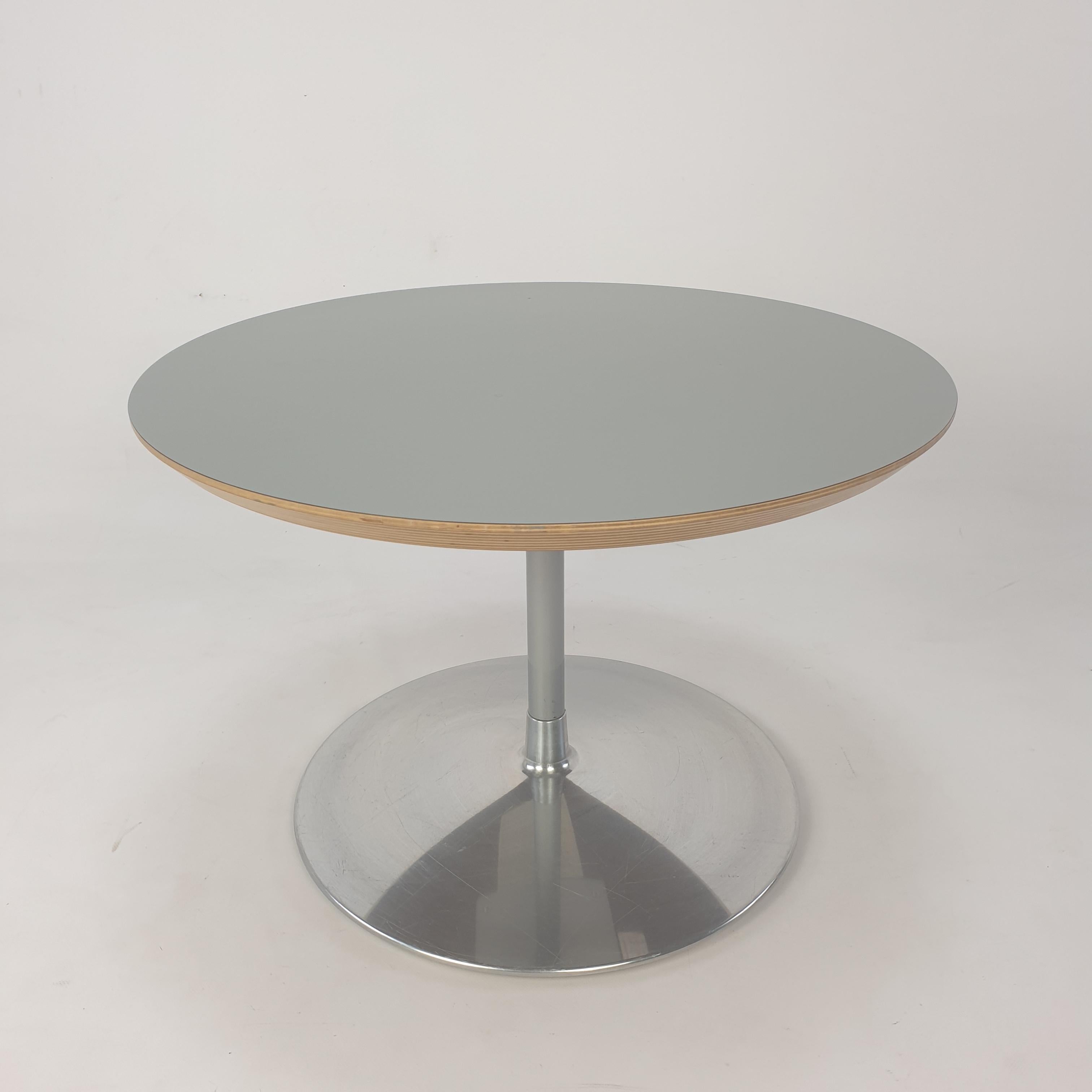 Very nice round coffee table, designed by Pierre Paulin in the 60's. 

The name of the table is 