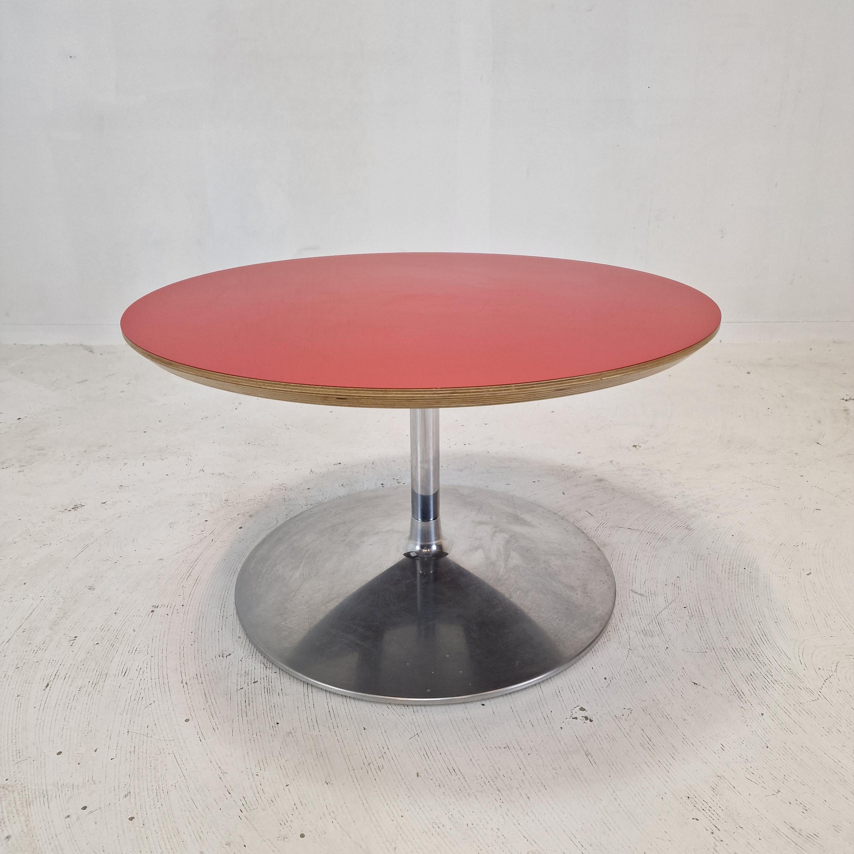Very nice round coffee table, designed by Pierre Paulin in the 1960s. 

The name of the table is 
