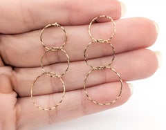 Kreisförmige Ohrringe aus 14k Gelbgold