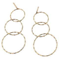 Kreisförmige Ohrringe aus 14k Gelbgold