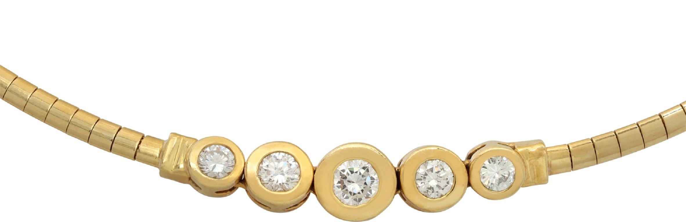 Collier en or jaune 18 carats avec environ 1,30 carats de diamants ronds de couleur G-H et de pureté VS. Mesure 17 pouces de long.
