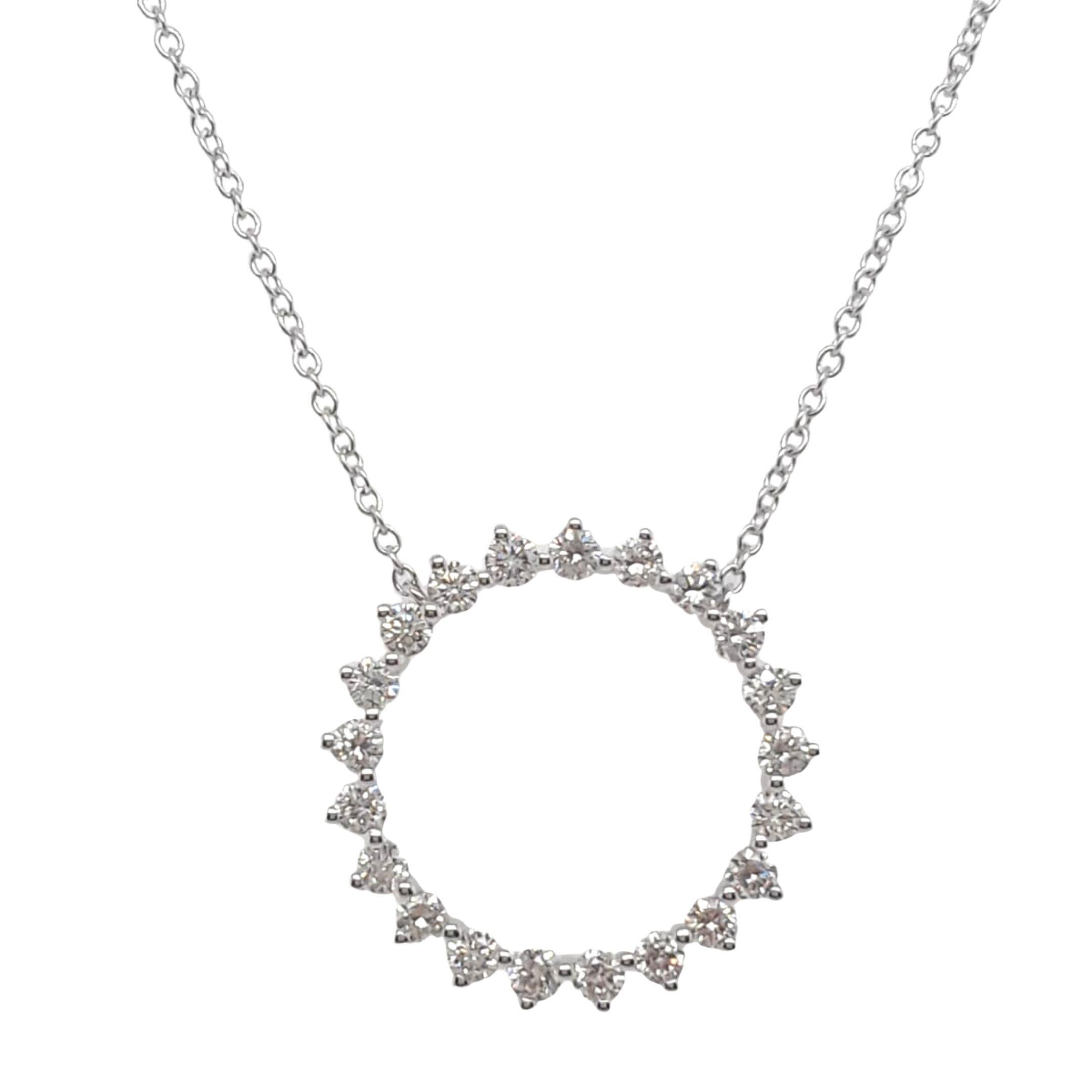 Large Circle Diamond Pendant Necklace made with real/natural brilliant cut diamonds. Diamond Weight: 0.85 carats, Diamond Quantity: 21 round diamonds. Color: G-H. Clarity: VS. Mounted on 18 karat white gold.