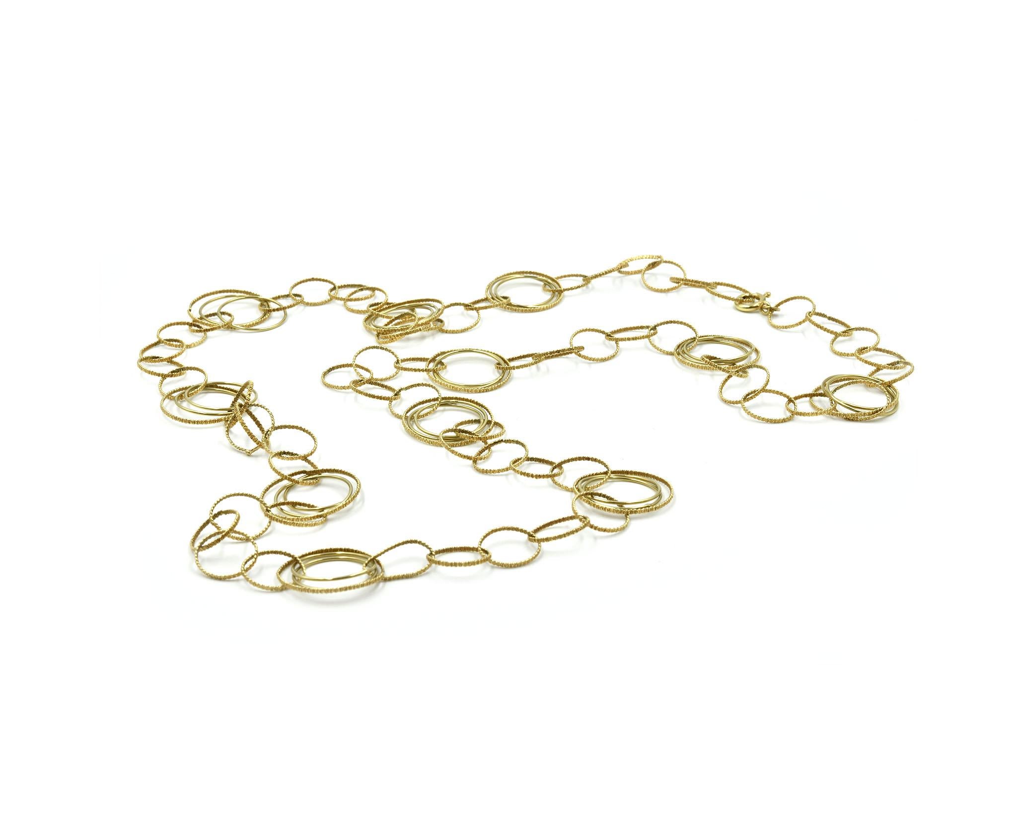 Designer: custom design
Material: 14k yellow gold
Dimensions: necklace measures 36-inches long and 3/4-inches wide
Weight: 33.68 grams
