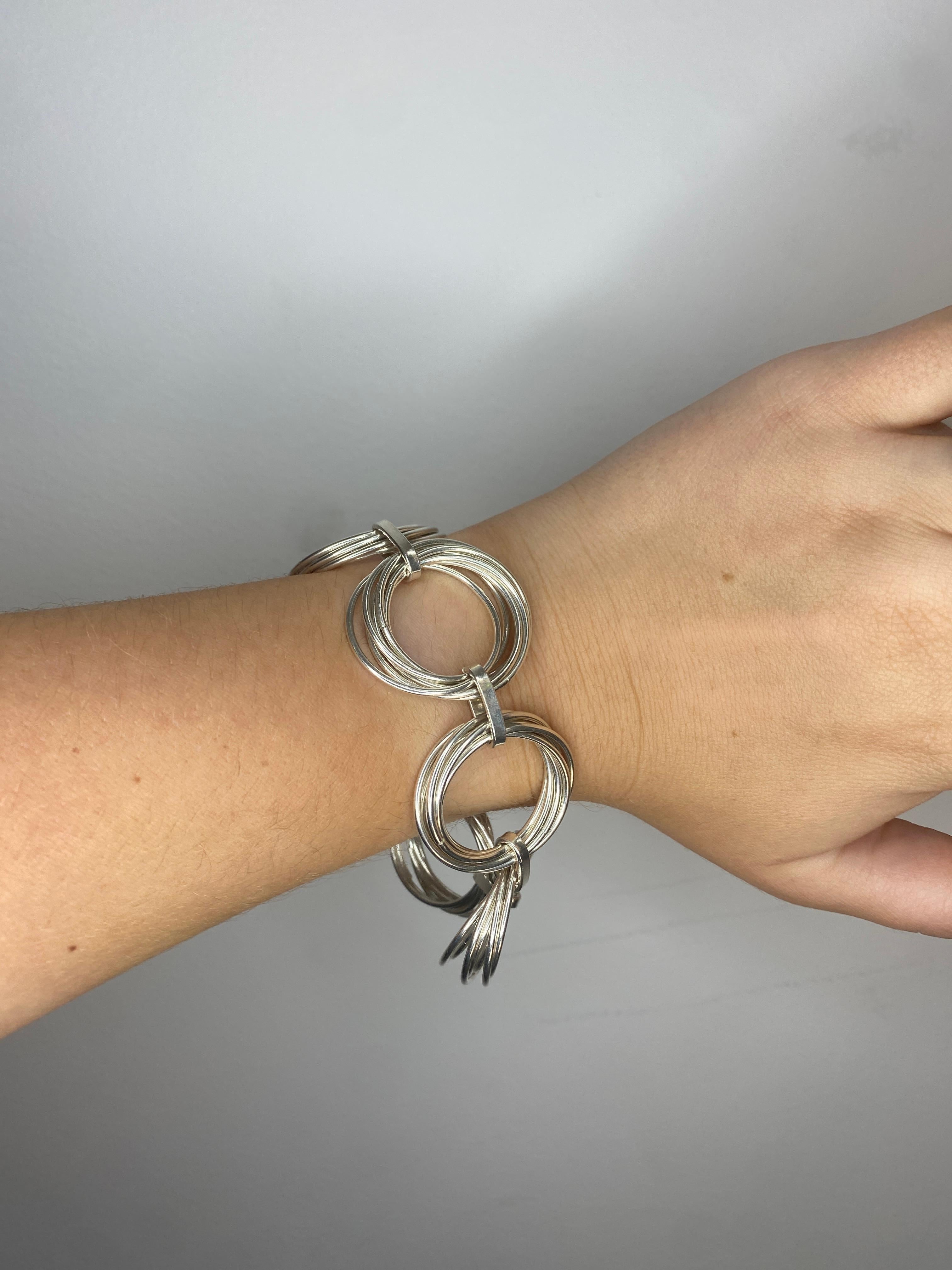 gold bracelet with circle and line through it
