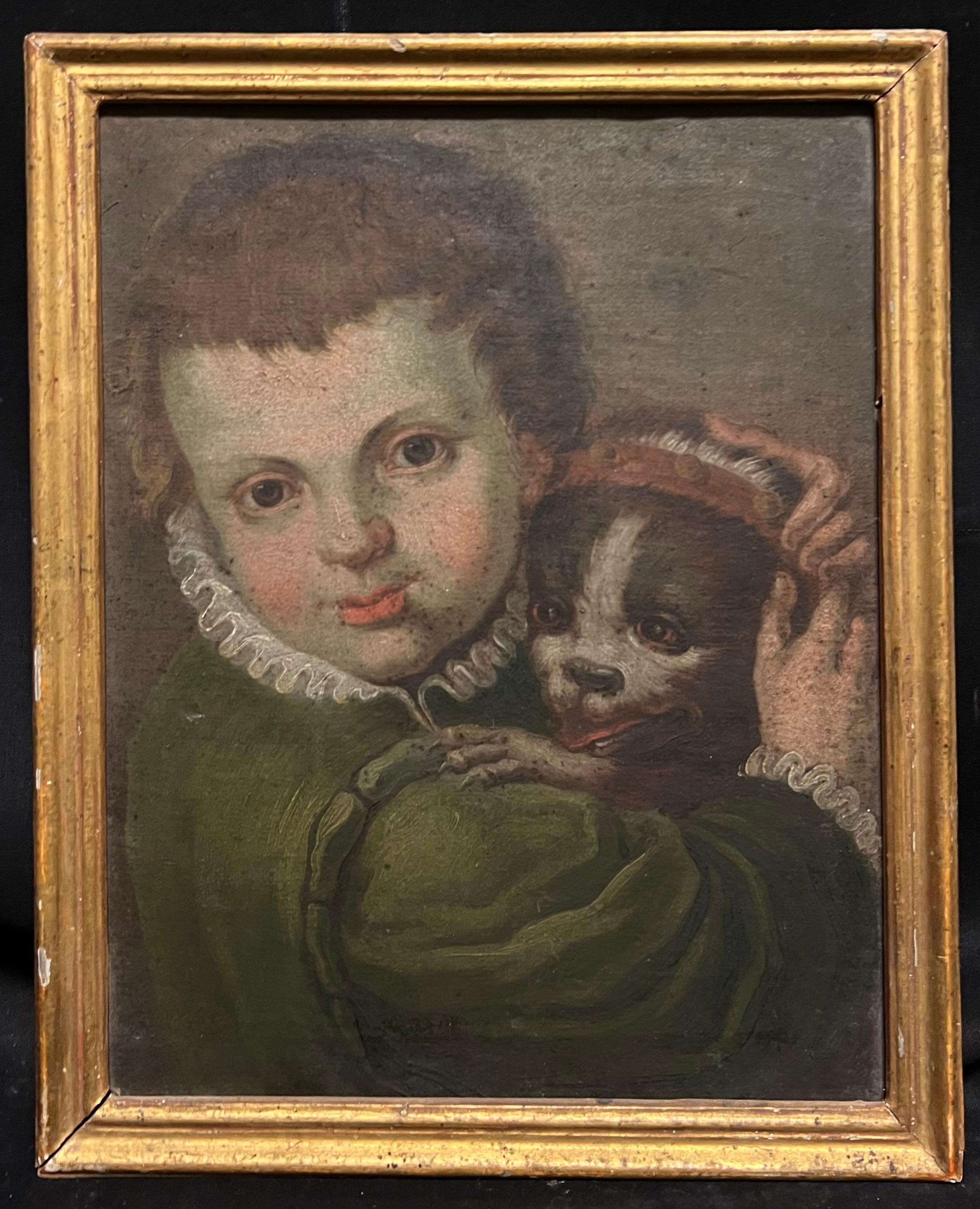 Raffinato ritratto barocco italiano del 1600 di un bambino con cane domestico dipinto ad olio - Painting di circle of Annibale Carracci