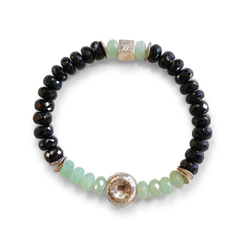 Story Behind The Jewelry
The balinese sterling circle is complimented with large mint green aventurine and faceted black onyx. The bracelet is a tribute to the circle of life which is a continuous journey that is filled with ups/downs, joy/sadness,