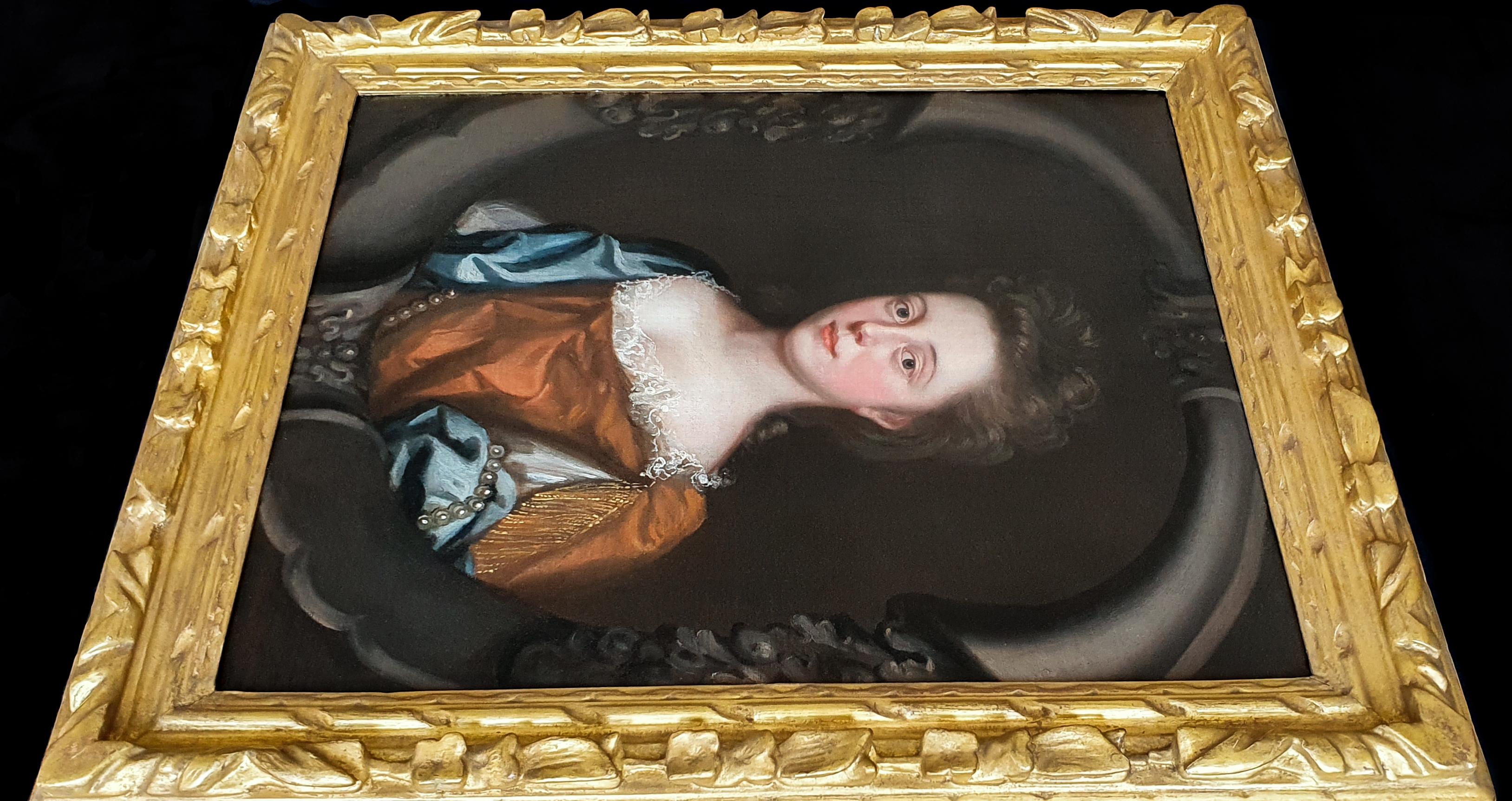 Portrait of a Young Lady in a Russet Dress with Blue Wrap c.1680’s; Mary Beale - Painting by (Circle of) Mary Beale