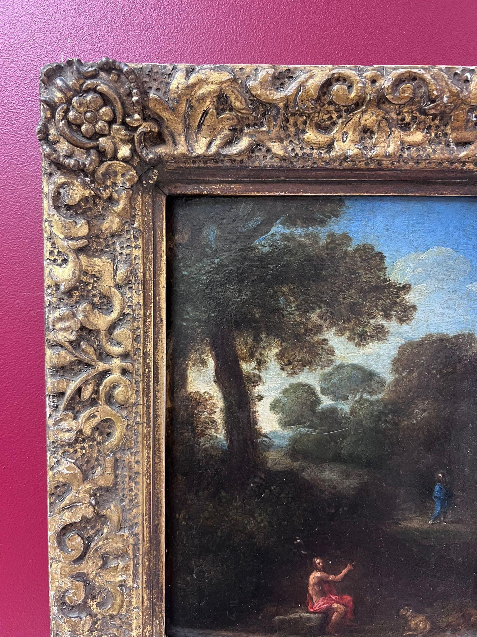 He aquí el Cordero de Dios
St. John the Baptist señalando a Cristo, caminando en paisaje. 
Viejo maestro italiano, primera mitad del siglo XVII
Círculo de Pier Francesco Mola (1612-1666)
óleo sobre tabla de madera, enmarcado en marco dorado