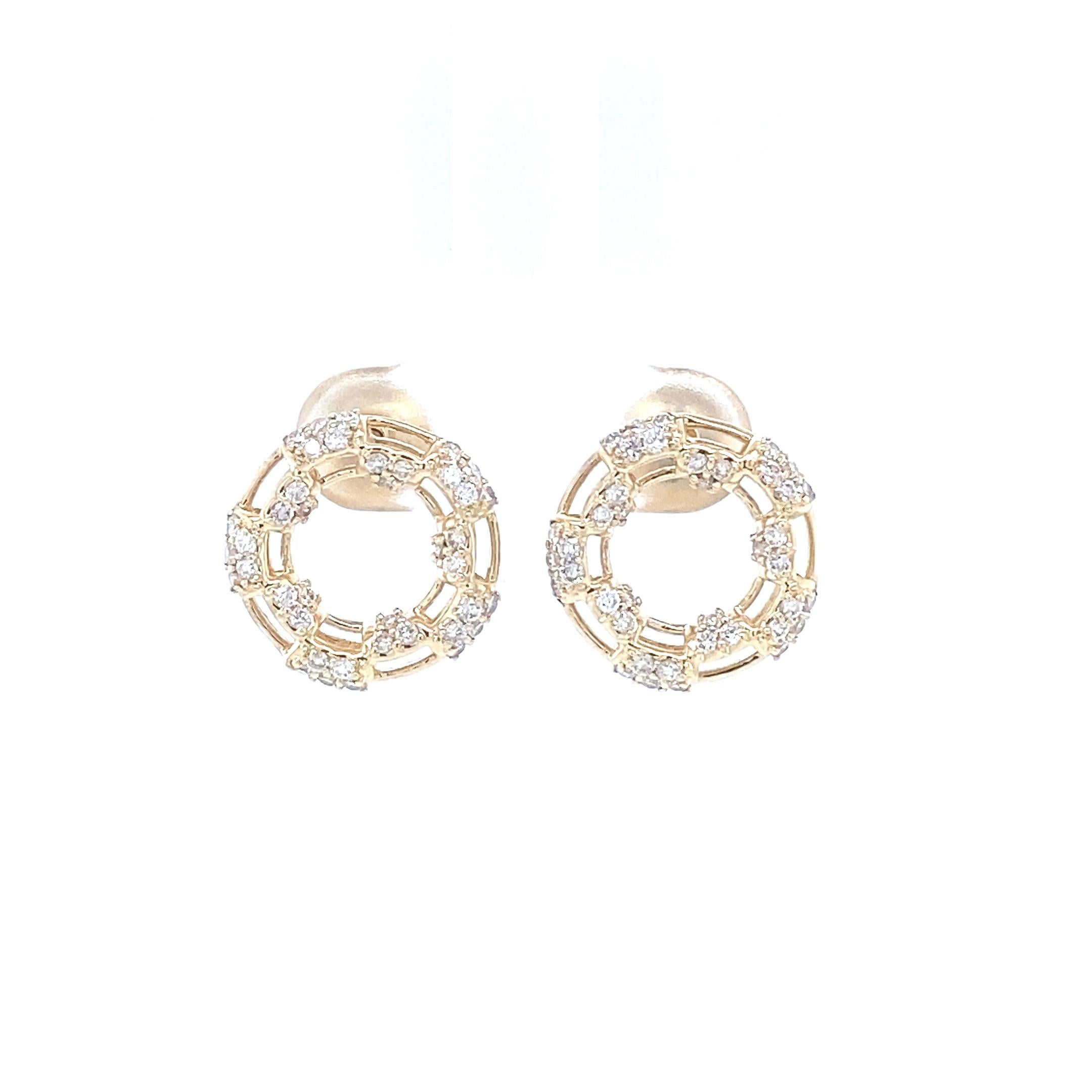 The earrings depicted are elegant, featuring a sophisticated geometric design composed of multiple interlocking circles. They are adorned with numerous small, round-cut diamonds meticulously set along the structure, giving off a dazzling sparkle