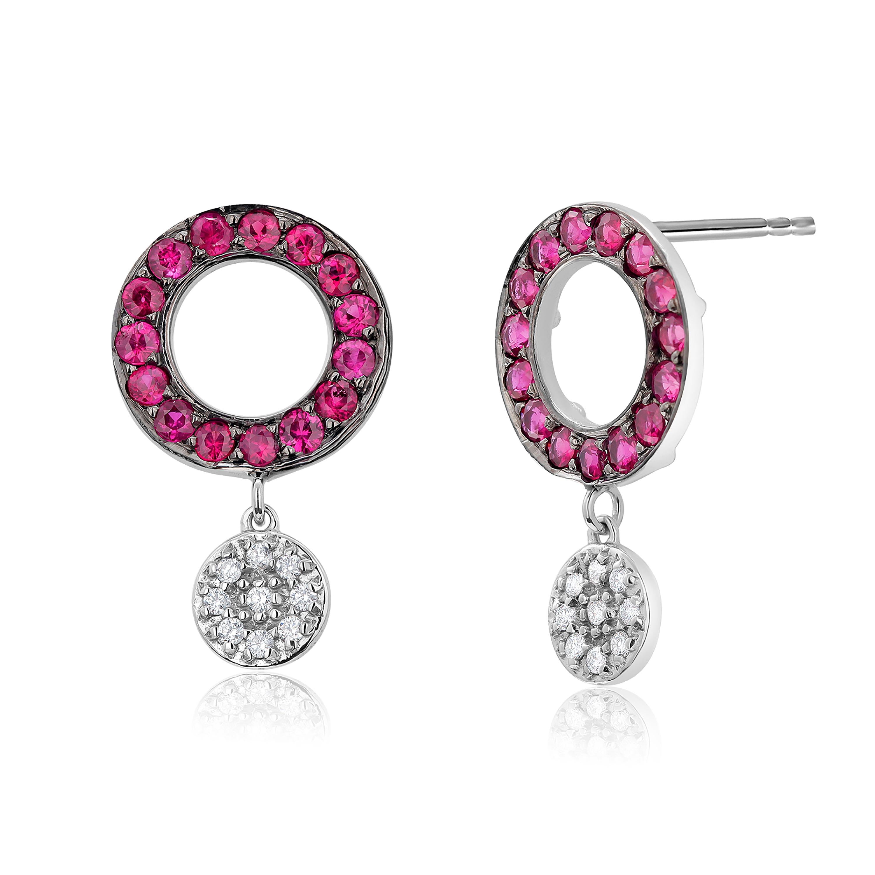 Fourteen karats white gold diamond and Blackened ruby circle cluster earrings 
Two round-shaped diamond drops weighing 0.20 carats
Round pave rubies circles, blackened, weighing 1.30 carats 
Ruby hue tone color is rose red 
New Earrings
Handmade in