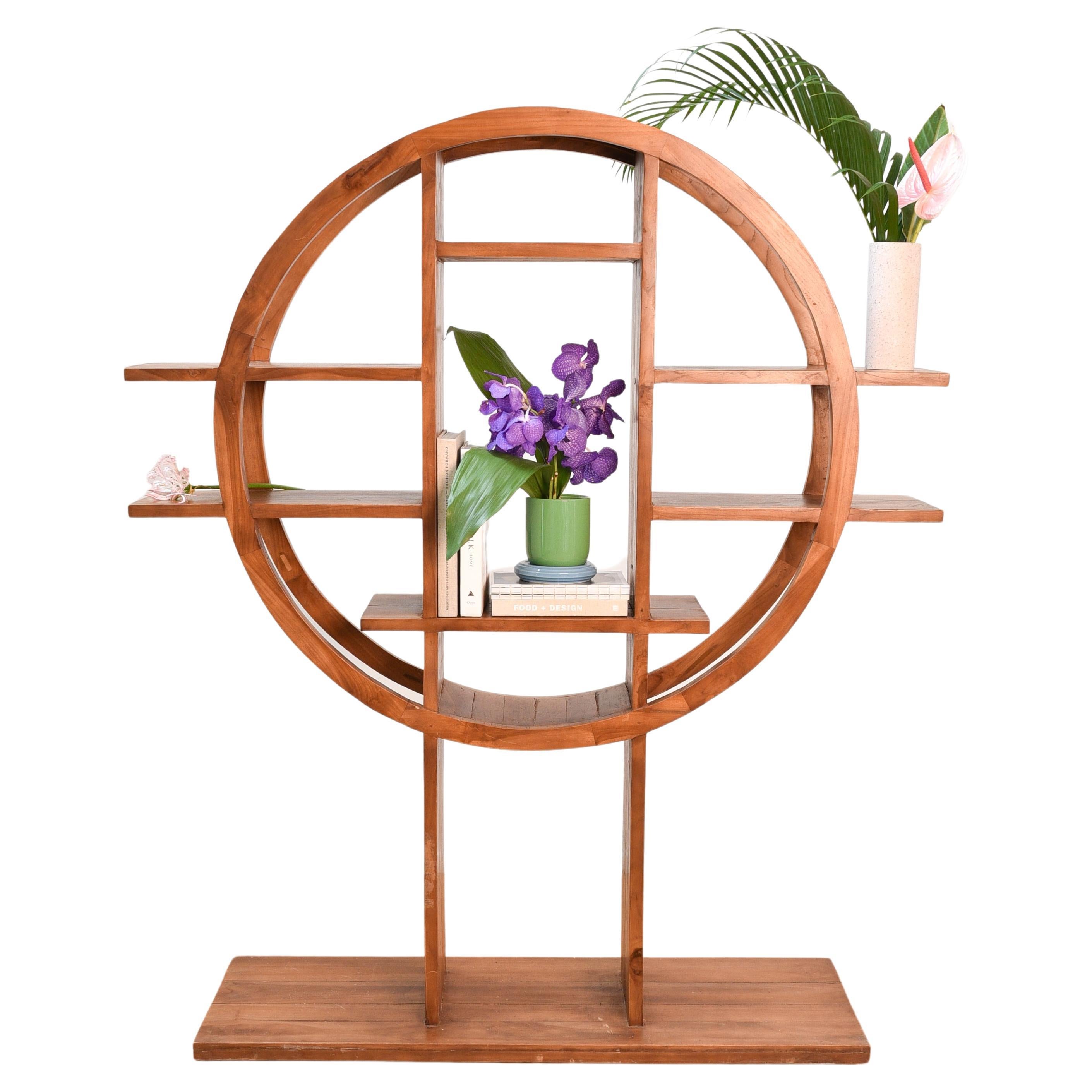 Circle-shaped book shelf/room divider in tropical wood For Sale