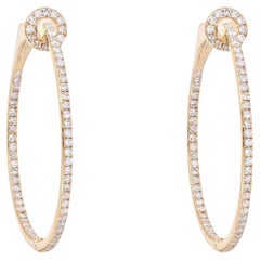 1.11ctw Diamond 14K Gold Oval Hoop Earrings